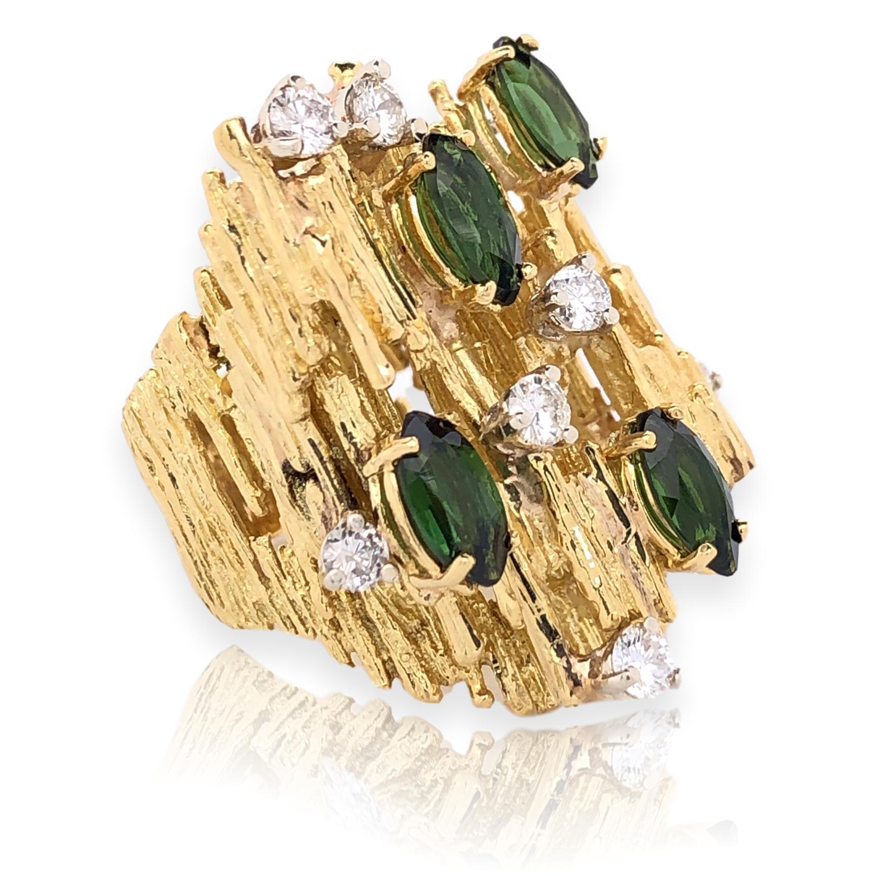 Green tourmaline and diamond 1970's fashion ring by New York City Jeweler Tishman and Lipp. The 1 1/4