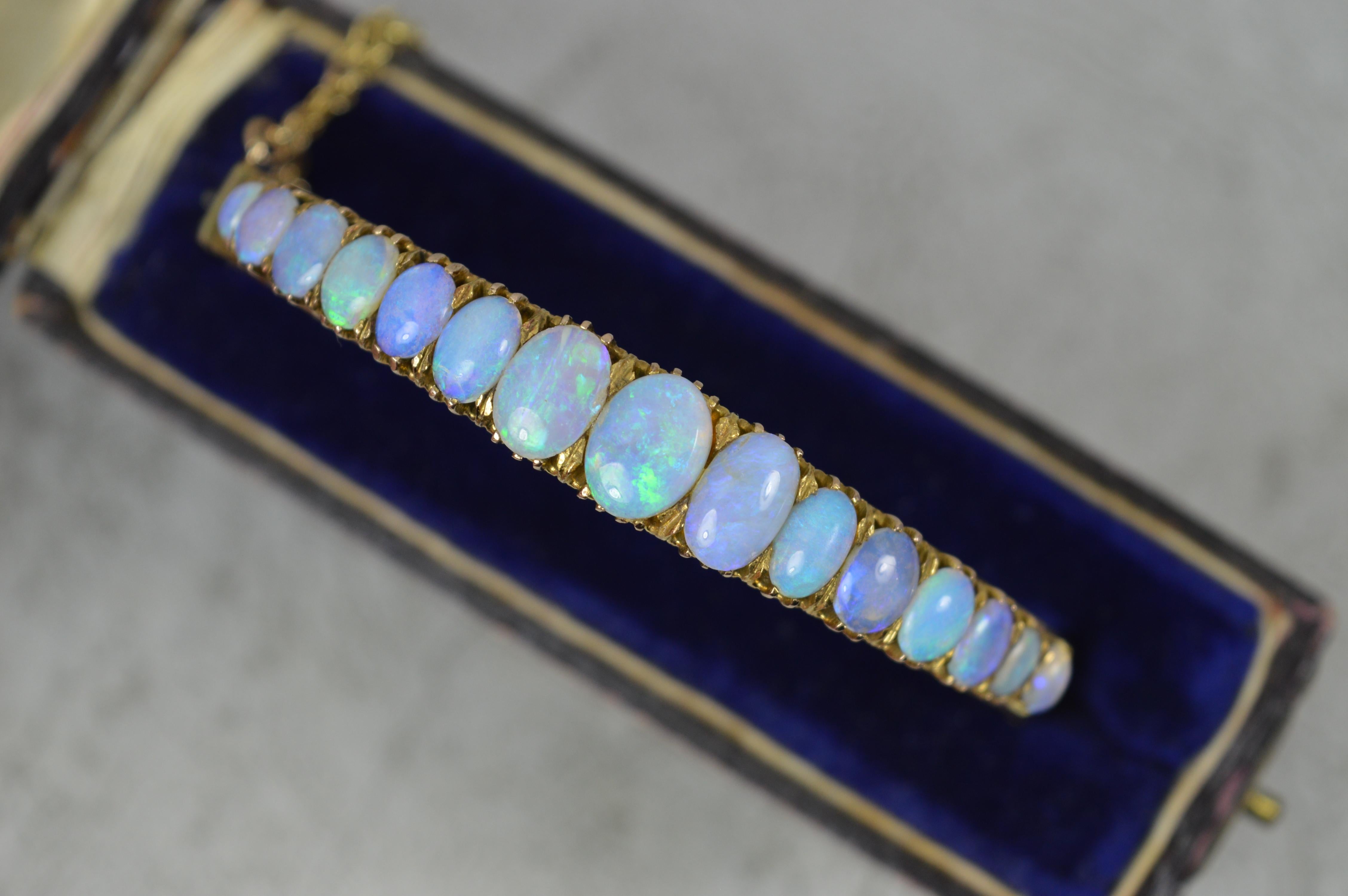 Oval Cut Impressive Victorian 9 Carat Gold and Natural Opal Bangle in Box For Sale