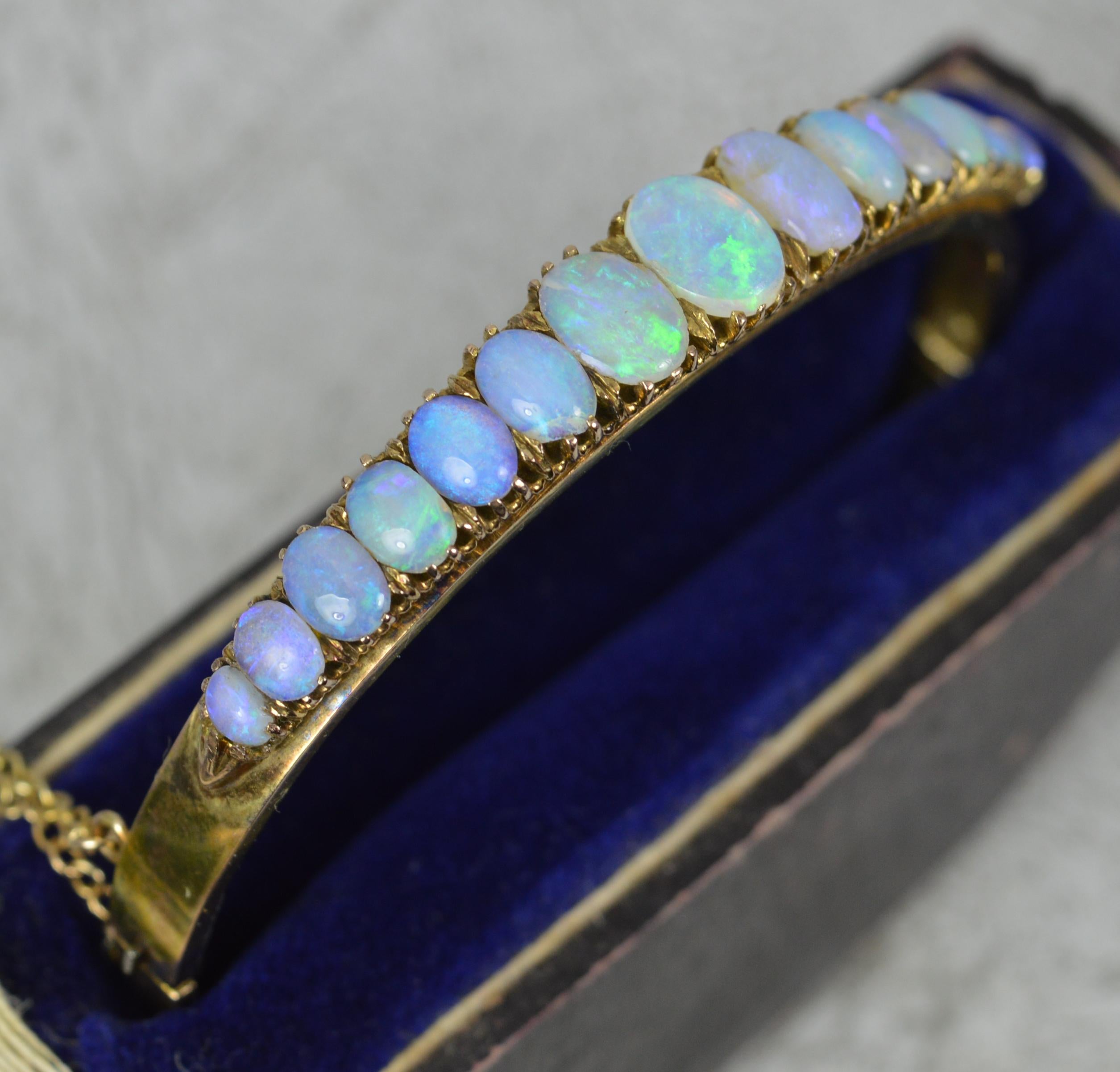 Impressive Victorian 9 Carat Gold and Natural Opal Bangle in Box In Good Condition For Sale In St Helens, GB