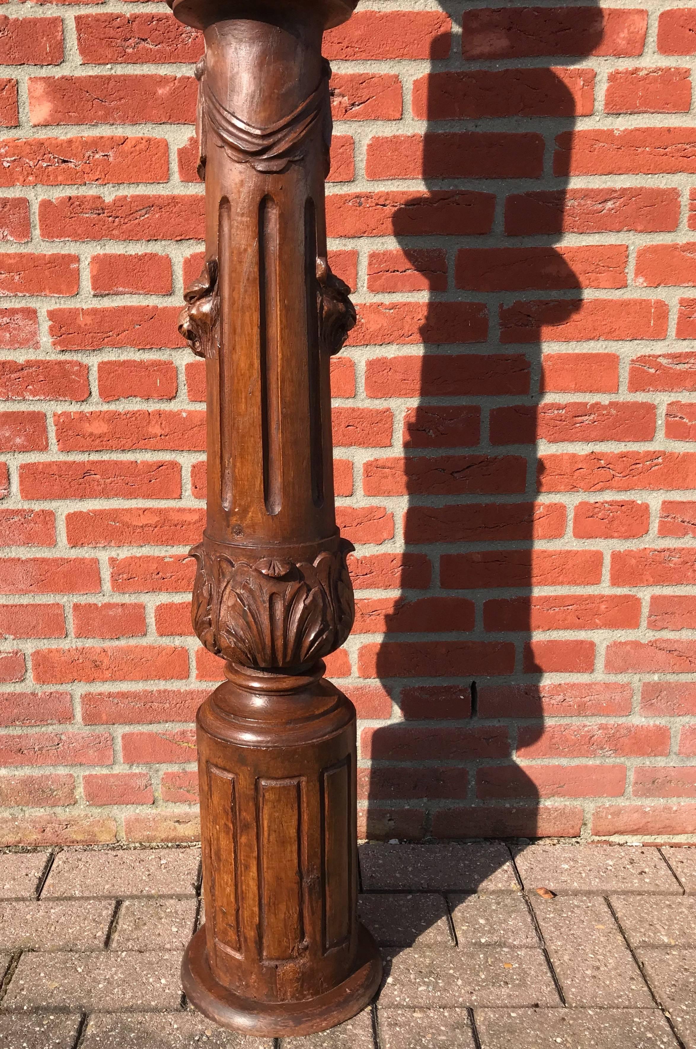 Hand-Carved Impressive Wooden Stair Newel Post or Display Pedestal with Carved Lion Heads For Sale