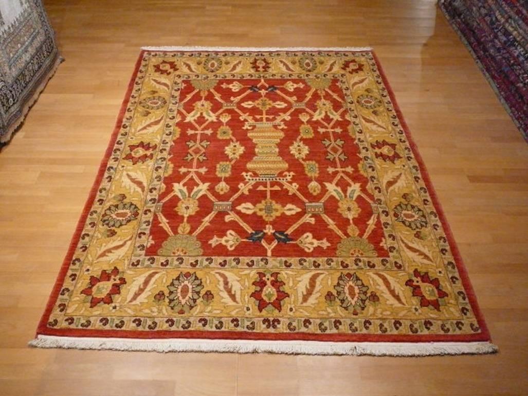 Unusual colored Mahal rug with natural dyes. Very good condition. Hand knotted in Afghanistan with a unusual color combination and dense pile.

Design: Mahal
Collection: Traditional by Djoharian Design
Materials: Wool,
Size: medium size rug with