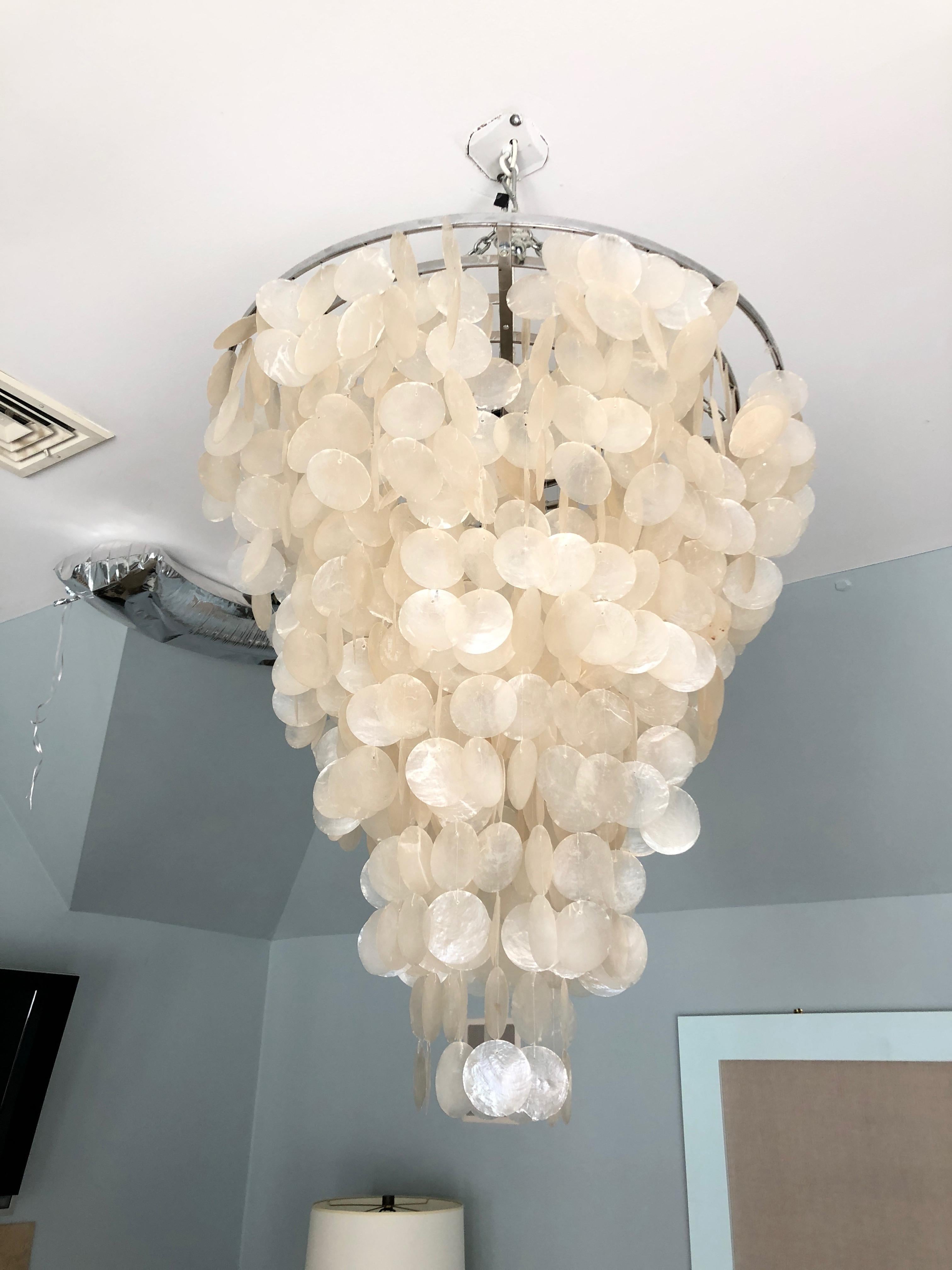 Iconic design of cascading layers of shell in a monumental size.
Drop from ceiling to top of fixture is 17.5.