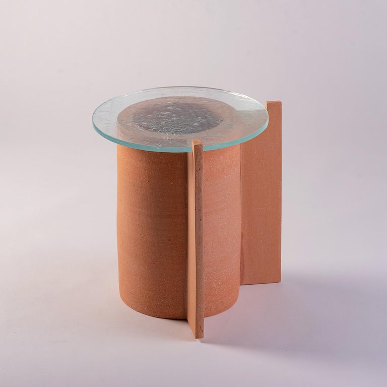 For the Impronta terracotta duo of tables, Peca designer Caterina Moretti was invited by her friend, the Australian designer Andrew Carvolth, to reinvent his pieces using traditional Mexican craftsmanship and materials. The cylindrical tables each