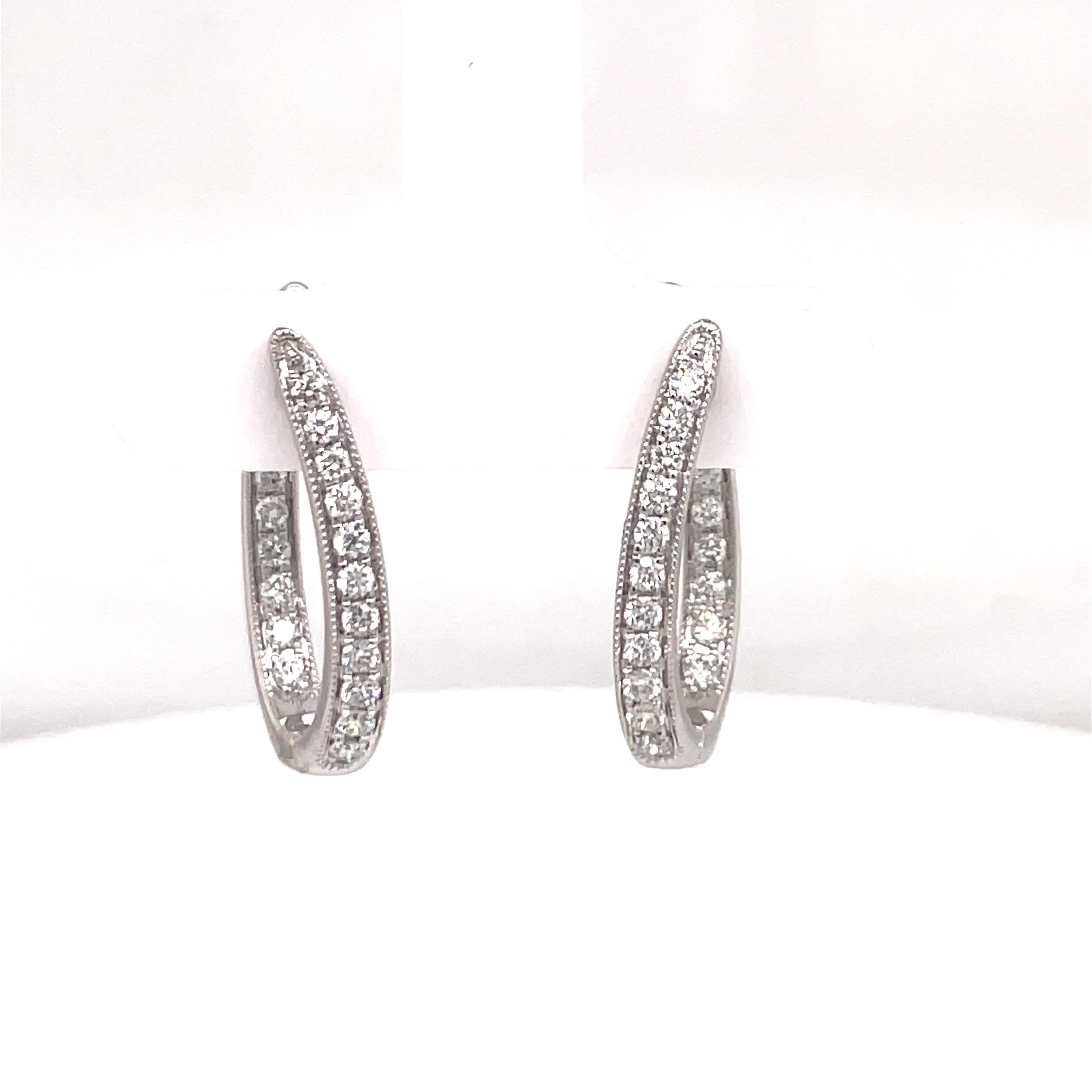 Contemporary In and Out Diamond Hoop Earrings 0.65 Carats 14 Karat White Gold 3.5 Grams For Sale