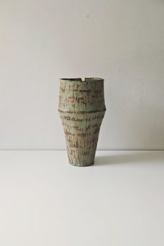 In Bloom IV Ceramic Vase by Antonia Maria