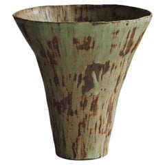In Bloom V Ceramic Vase by Antonia Maria