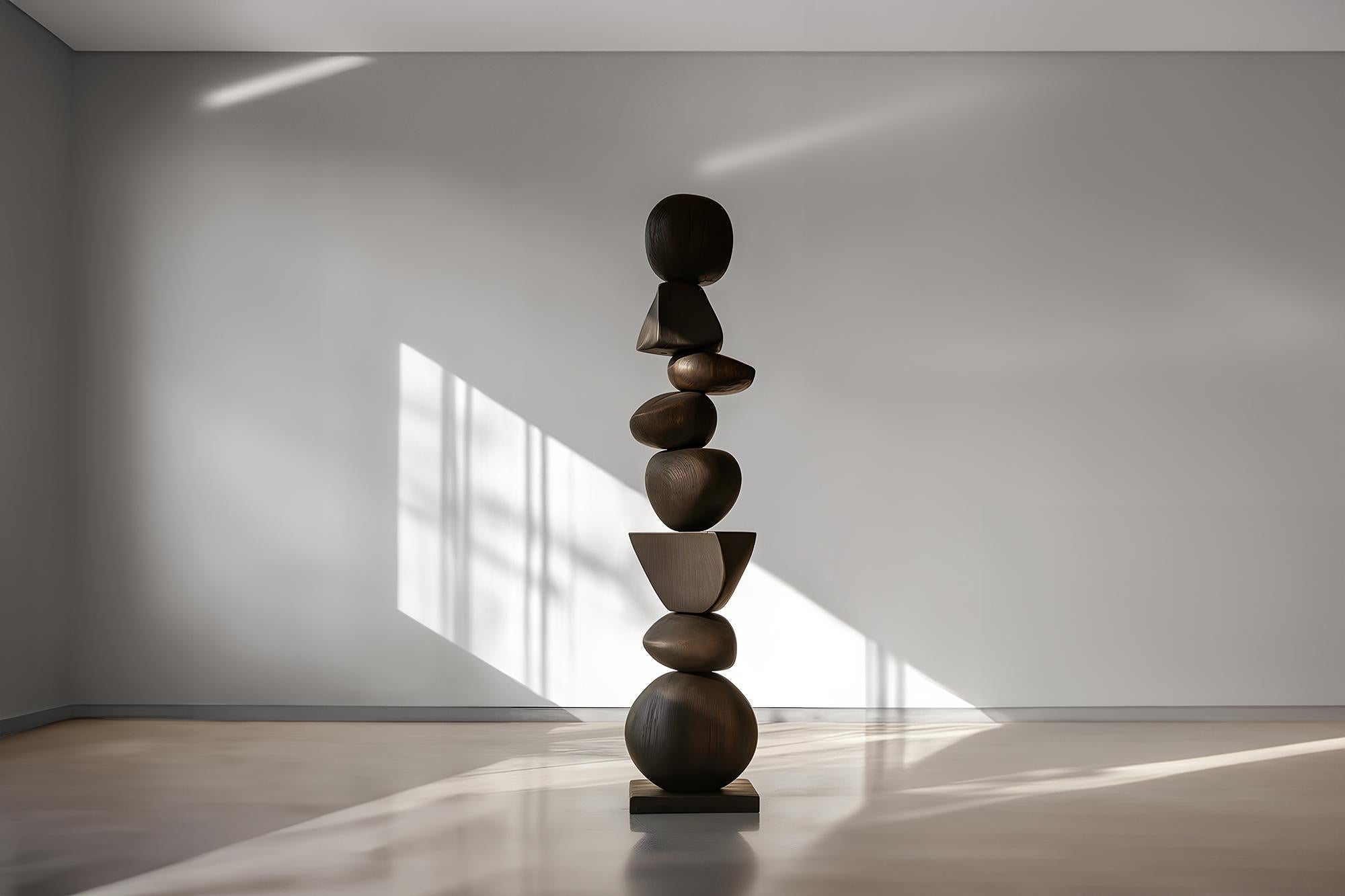 In Burned Oak, a Dark Biomorphic Sculpture of Elegance Emerges, Still Stand No97
_
Joel Escalona's wooden standing sculptures are objects of raw beauty and serene grace. Each one is a testament to the power of the material, with smooth curves that