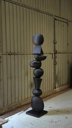 In Burned Oak, a Dark Biomorphic Sculpture of Elegance Emerges, Still Stand No97