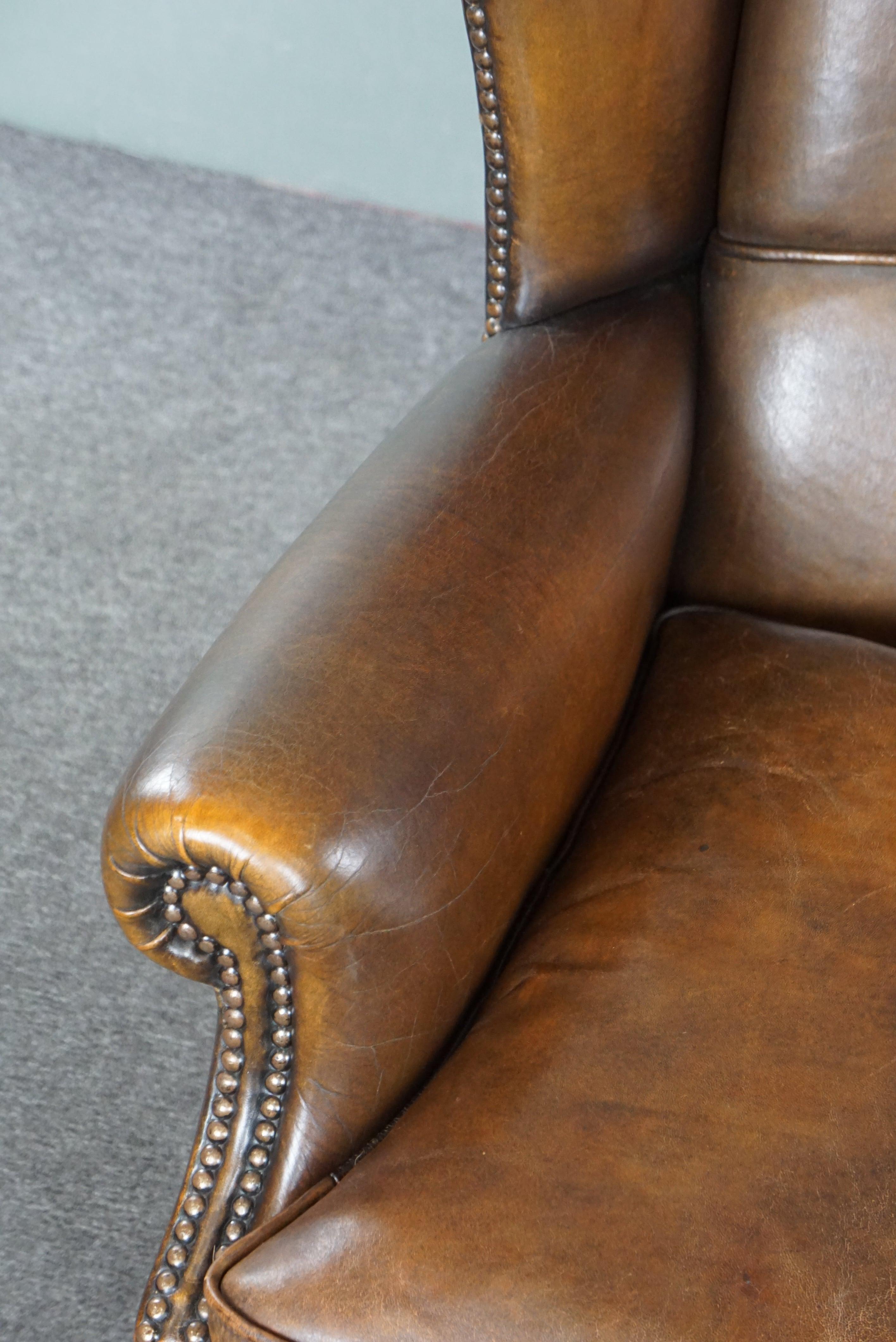 In good condition wingback chair made of sheepskin For Sale 2