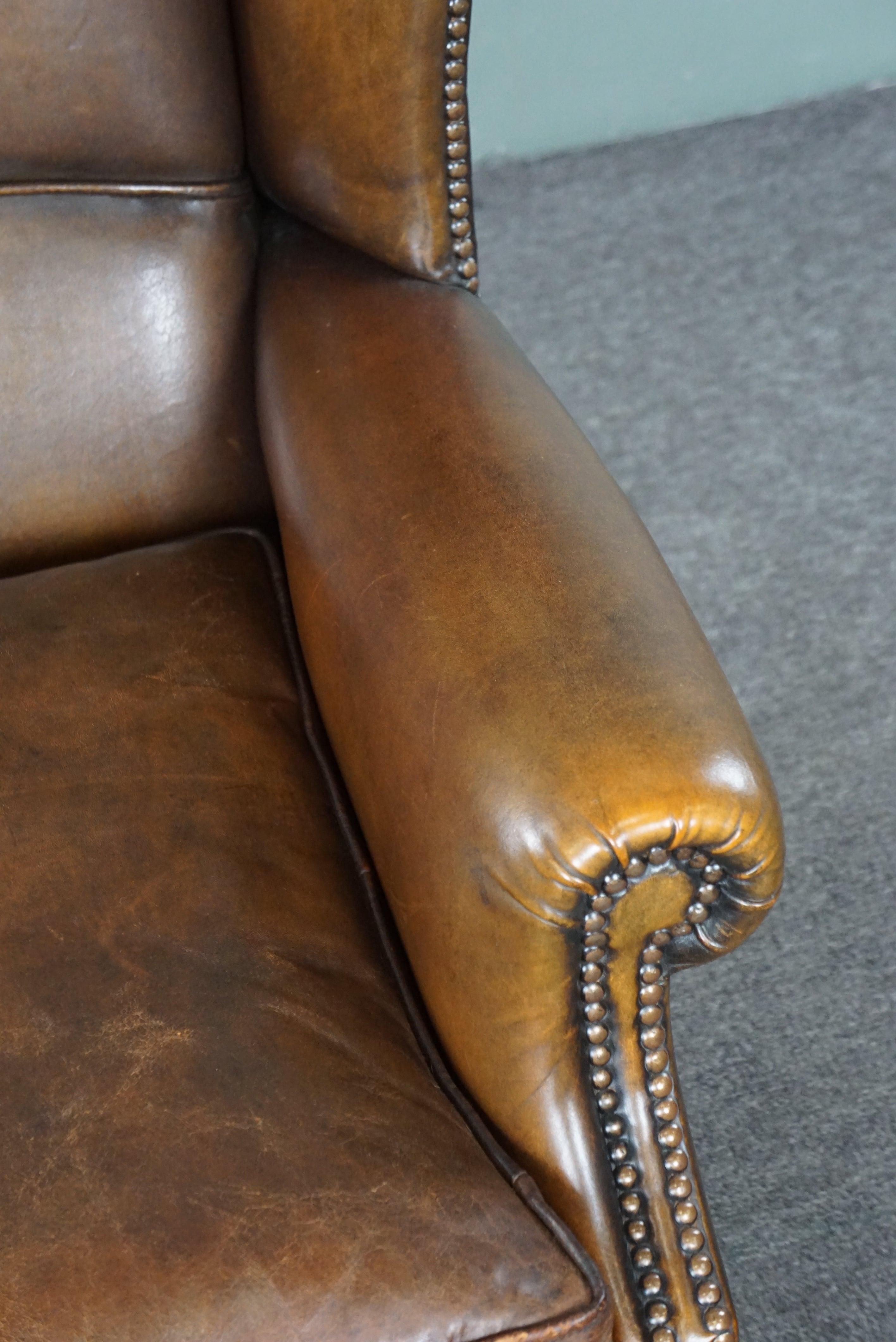 In good condition wingback chair made of sheepskin For Sale 3