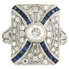 in memory of ART DECO 18k gold ring with sapphire and brilliant cut diamonds