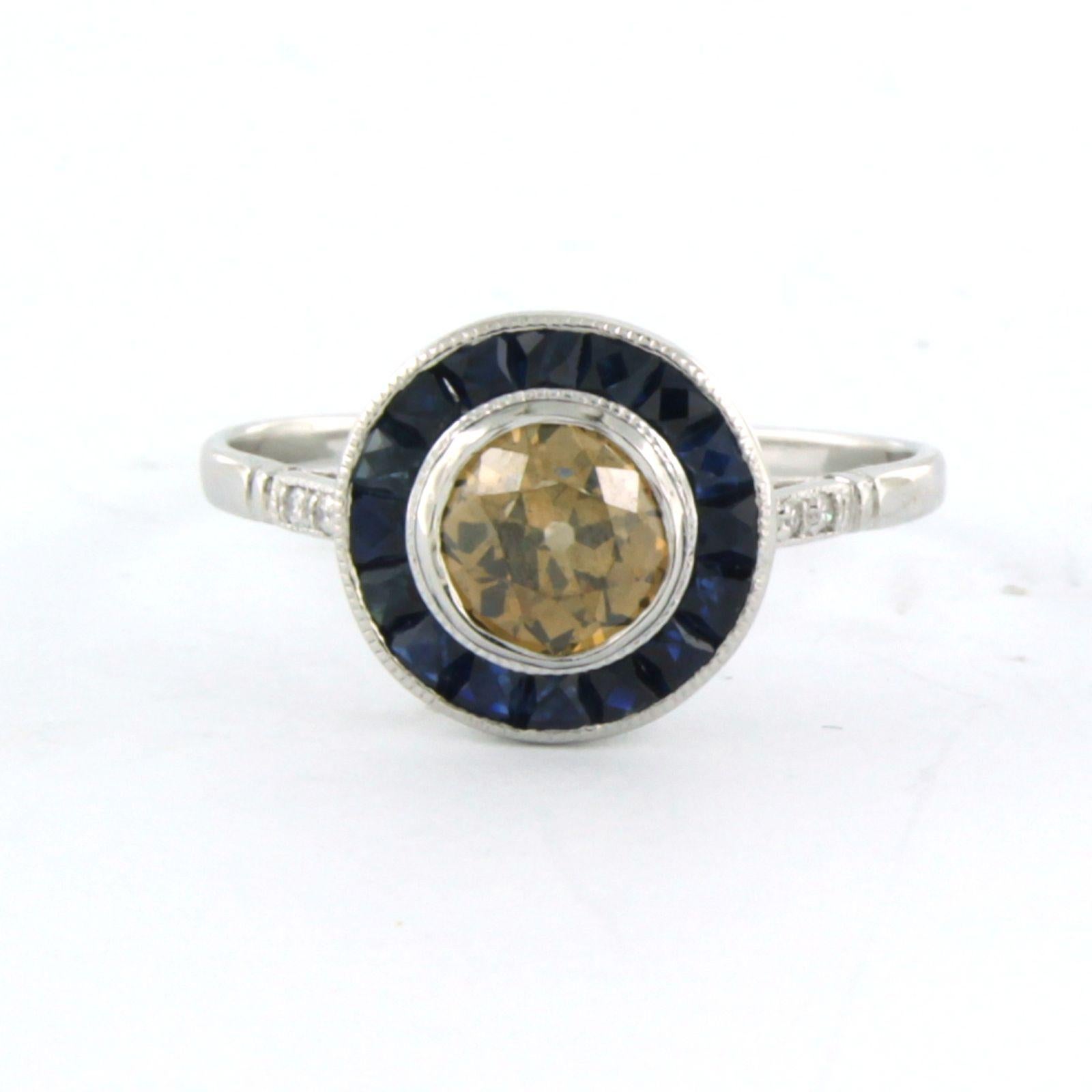 14k white gold ring set with sapphire and old mine cut and brilliant cut diamonds up to 0.78ct - N/O, F/G - VS/SI - ring size US 6.75 - EU 17.25 (54)

detailed description:

the top of the ring has a diameter of 1.0 cm wide by 5.8 mm high

Ring size