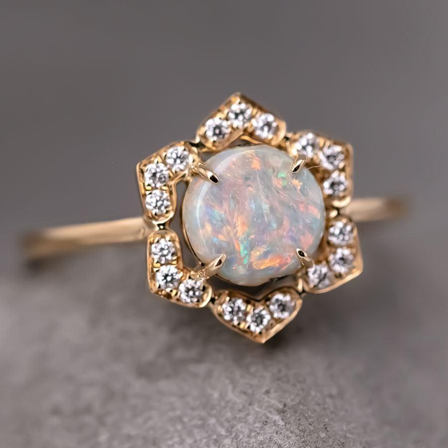 You Are in My Heart - Australian Boulder Opal Diamond Engagement Ring 18K Yellow Gold.



Design name: You Are in My Heart!

Design idea: An Australian Boulder opal is elegantly encircled by six heart shapes, symbolizing 