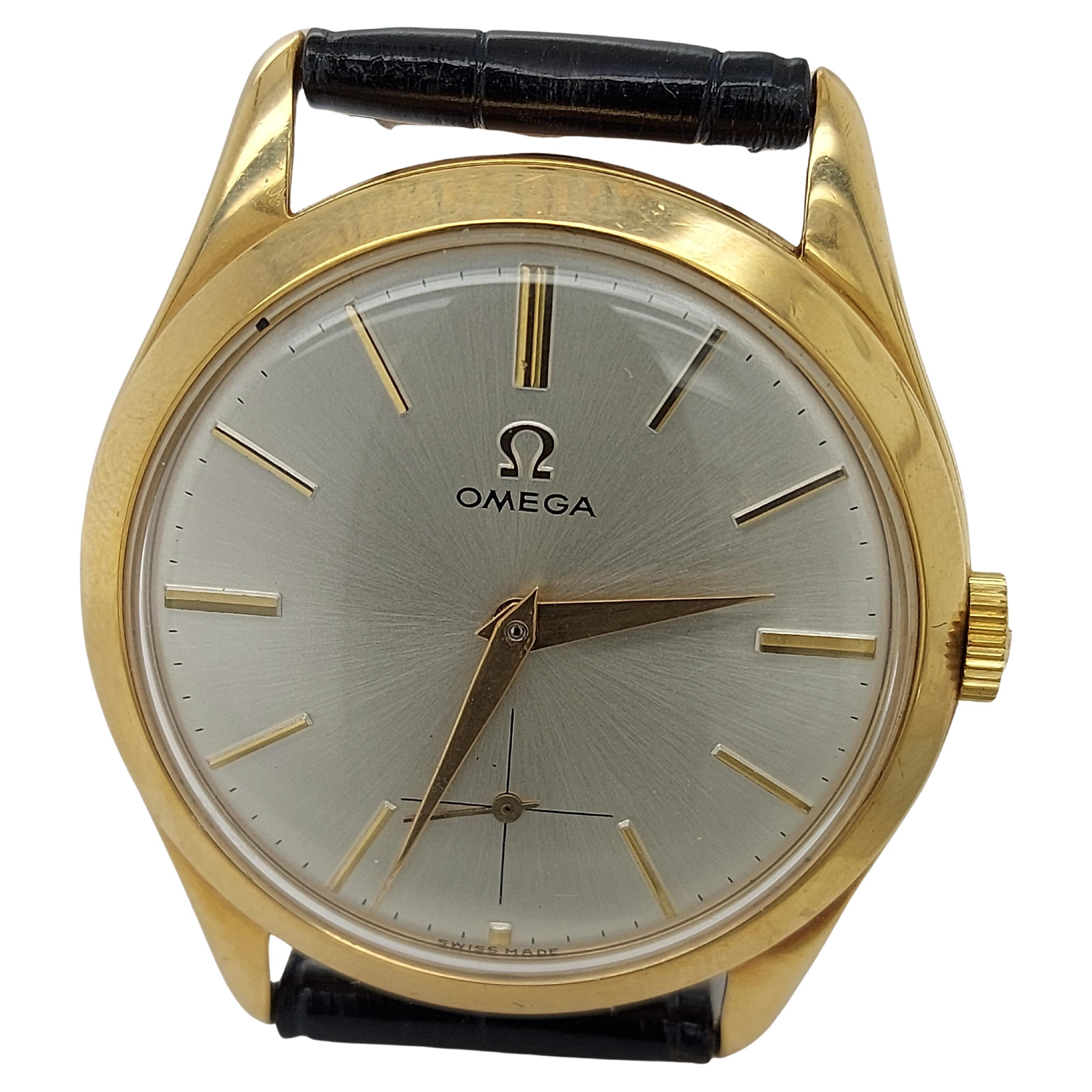 In Perfect Condition 18kt Yellow Gold Omega Reference 2619, Mechanical Movement, 

Functions: Hours, Minutes, 

Movement: Mechanical movement - Calibre 265

Case: 18kt Yellow gold case, diameter 35.5 mm, thickness 9.6 mm, pressure closure case