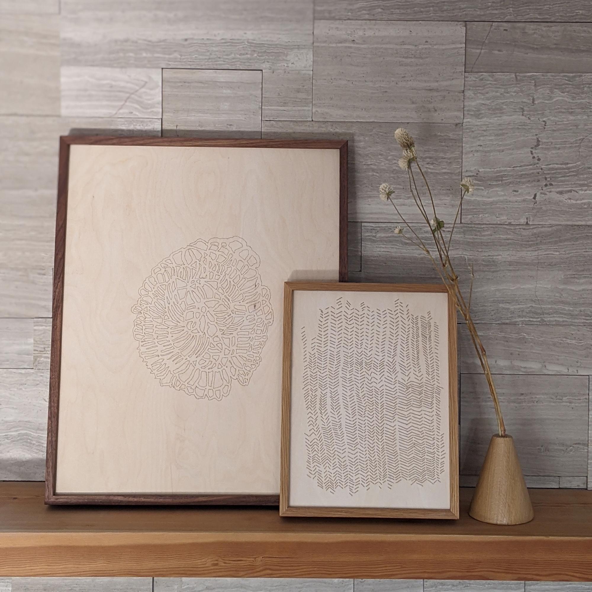 Hanging artwork on your wall is a wonderful commitment and these In Prints are definitely worth it. These prints are etched into white washed baltic birch plywood in a variety of sizes. 
Displaying meaningful items that will be beautiful for years