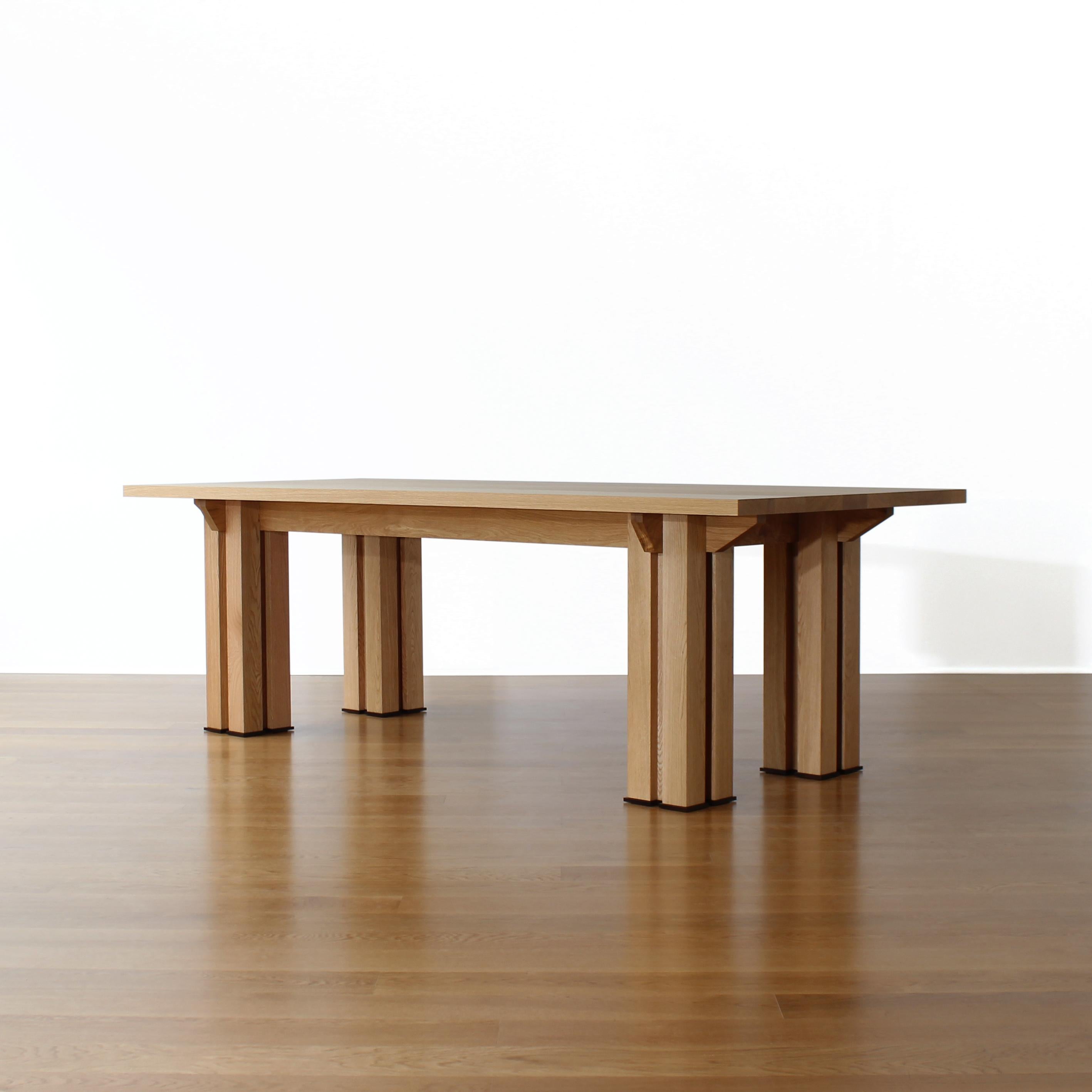 Bonnie dining or conference table by Crump and Kwash.

Solid white oak legs, frame, and top / acrylic table top sealer / bronzed steel feet 

This table is ready to ship. 


