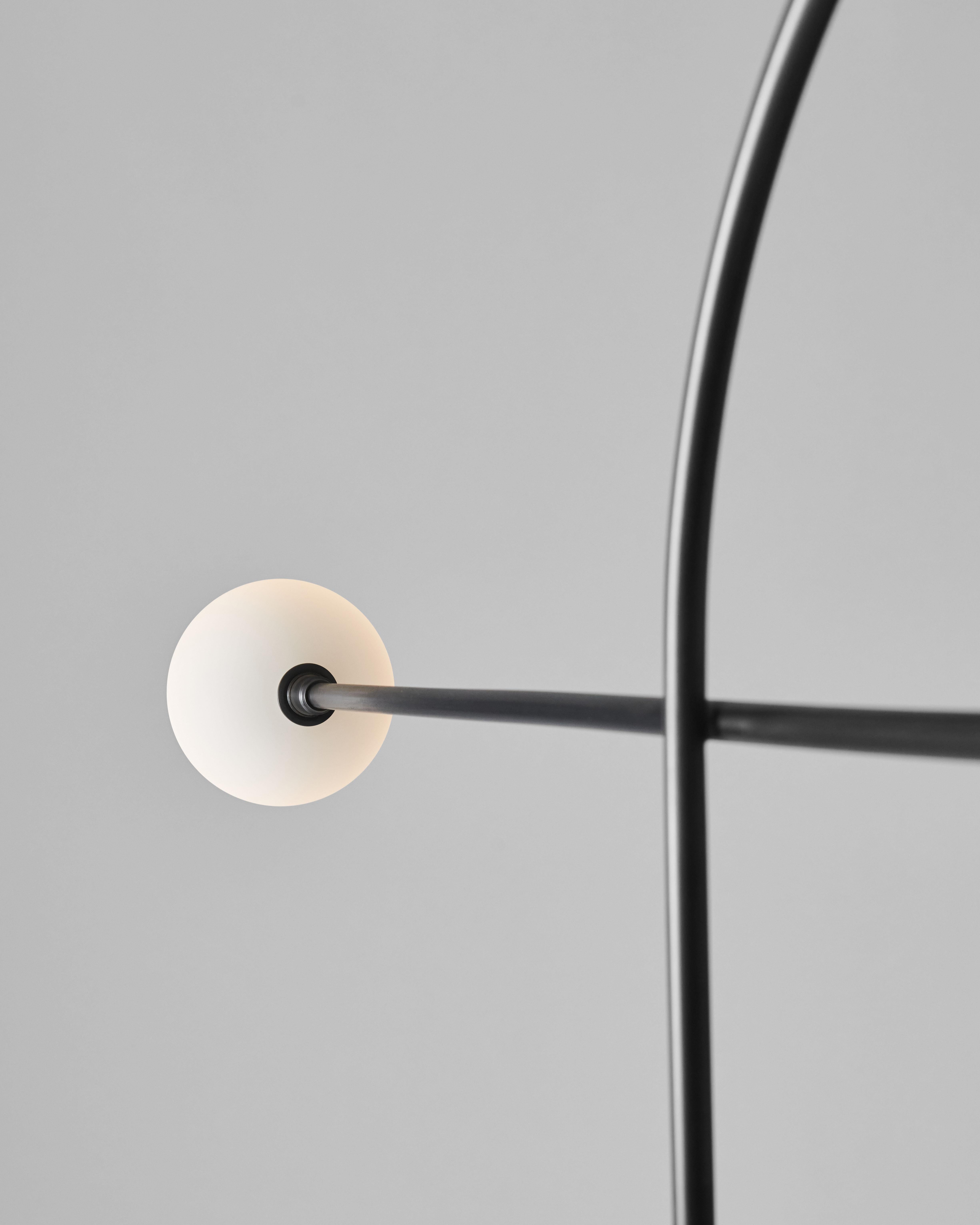 Minimalist in Stock Bow Floor Lamp in Blackened Steel and Hand Blown Glass, Estudio Persona For Sale