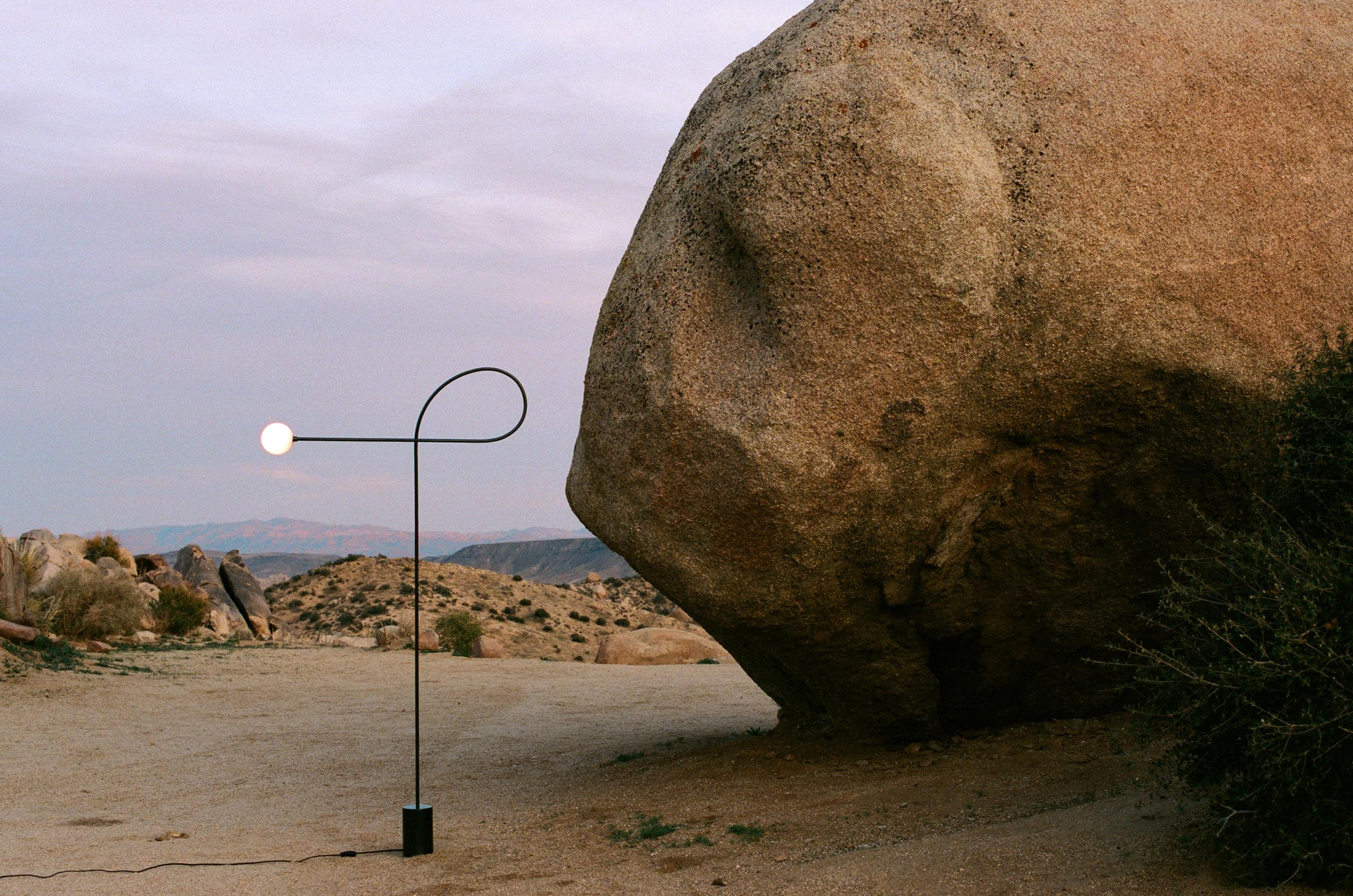 Contemporary In Stock Bow Floor Lamp in Blackened Steel and Hand Blown Glass, Estudio Persona For Sale