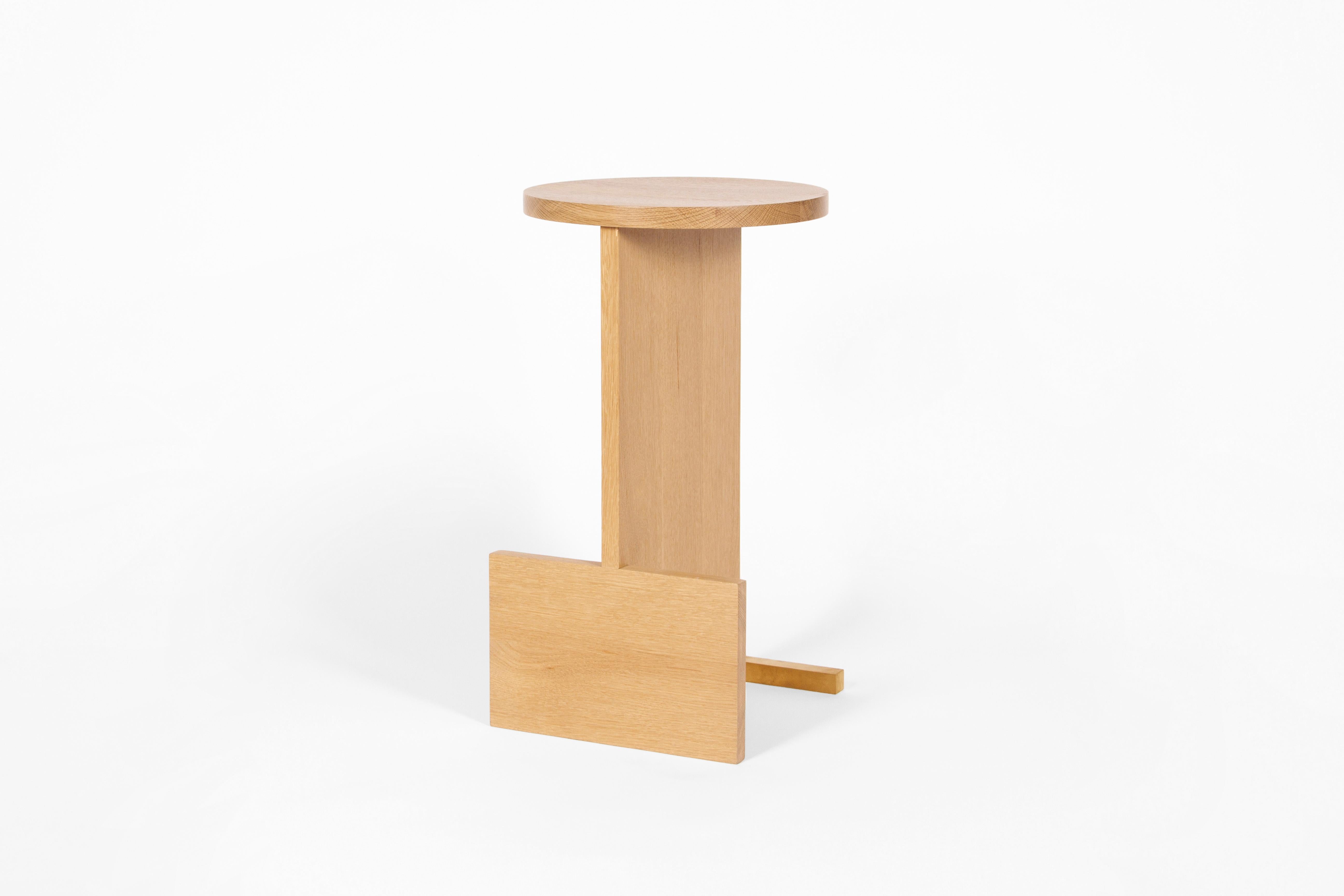 A minimal, timeless counter stool in solid white oak with a brass base detail. This stool can be made for counter or bar height.
Three in stock available now, ready to ship.

Materials: White oak, brass

Made to order also available in: Walnut,