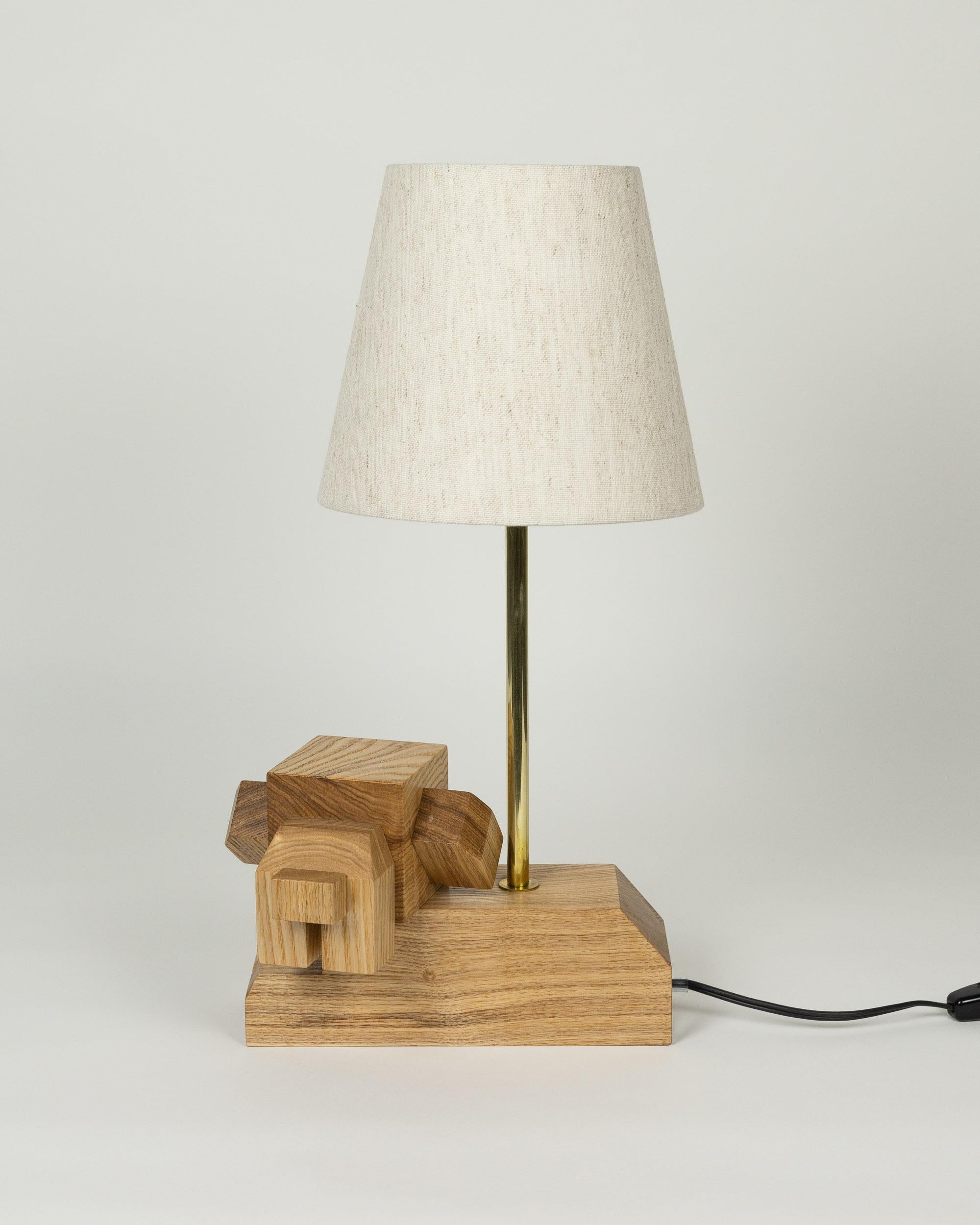 Doggy Lamp by Wan Wan Wonderland (Tokyo, Japan)

Delightful and whimsical table lamp with white pleated shades and expertly hand-crafted black wooden base. Each lamp is hand crafted by WAN(of WAN WAN WONDERLAND), an artist and dog lover, at her