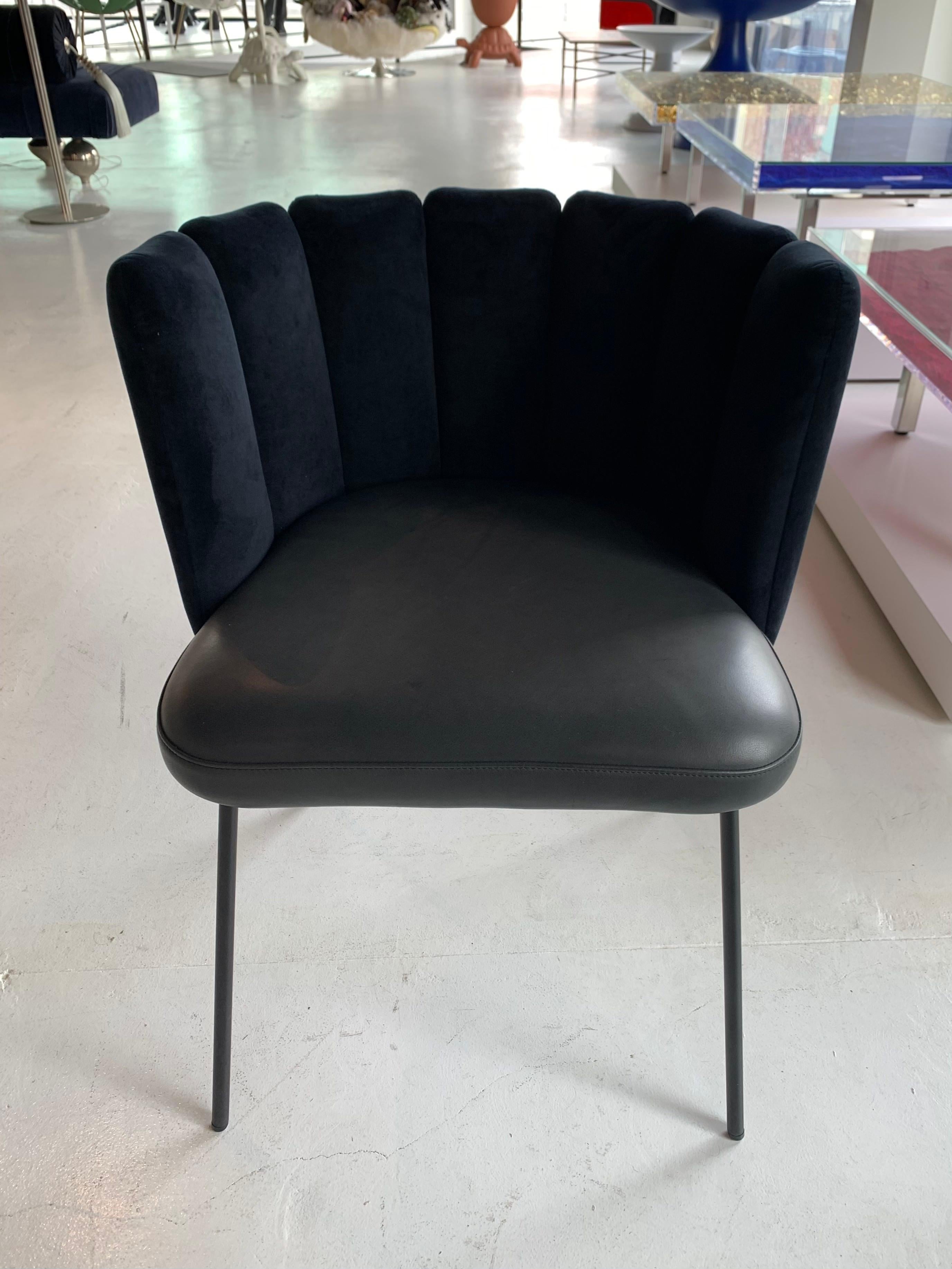 In stock in Los Angeles

Gaia velvet and leather upholstered dining armchair.
The GAIA collection is a new creation designed by the well-known Italian designer Monica Armani.? GAIA’s sensuous shapes and tangible comfort are guaranteed to