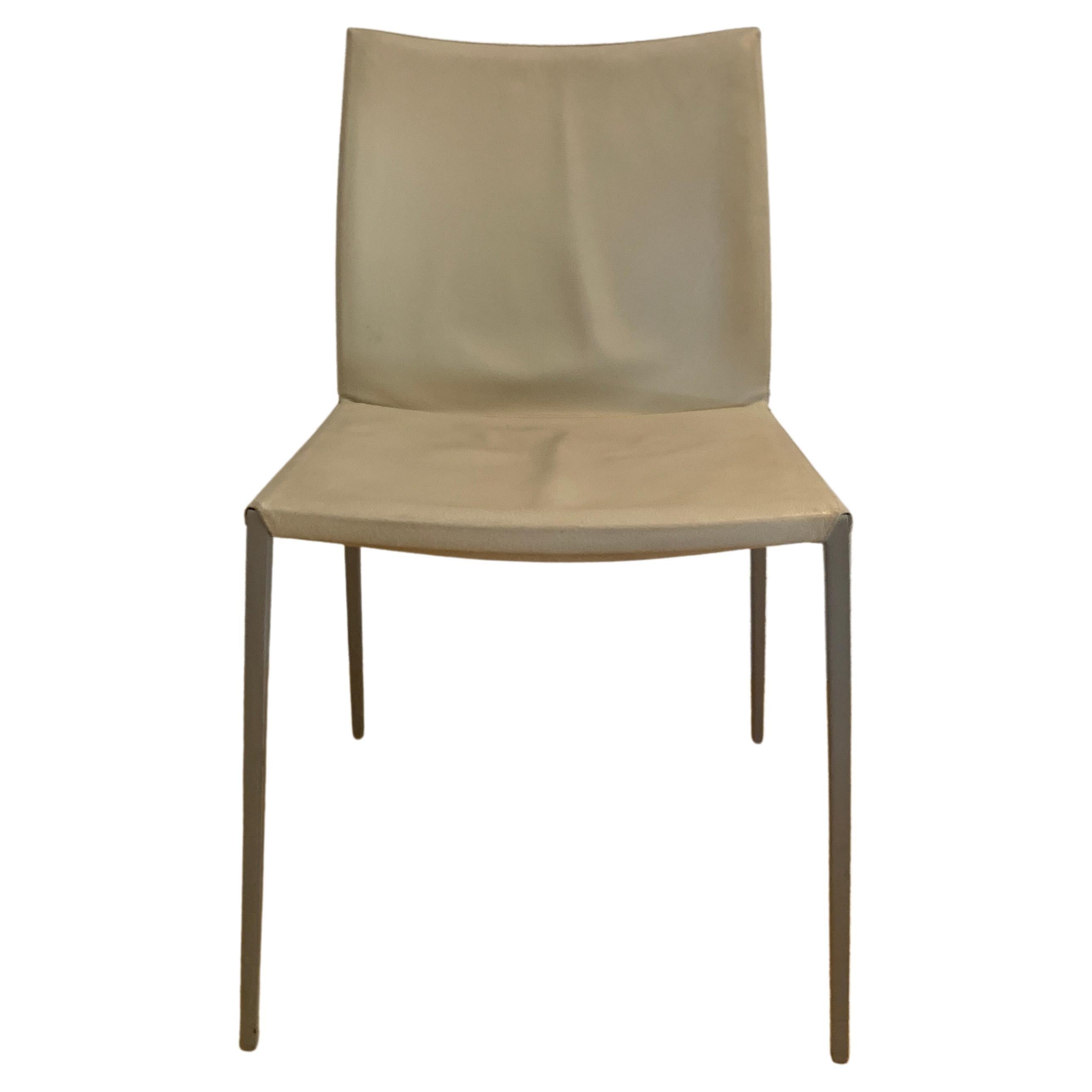 Lia leather dining chair by Roberto Barbieri for Zanotta.
Made in Italy.
In stock in Los Angeles.

Condition: Fiar (please refer to the product images to view the condition of the chairs).
 