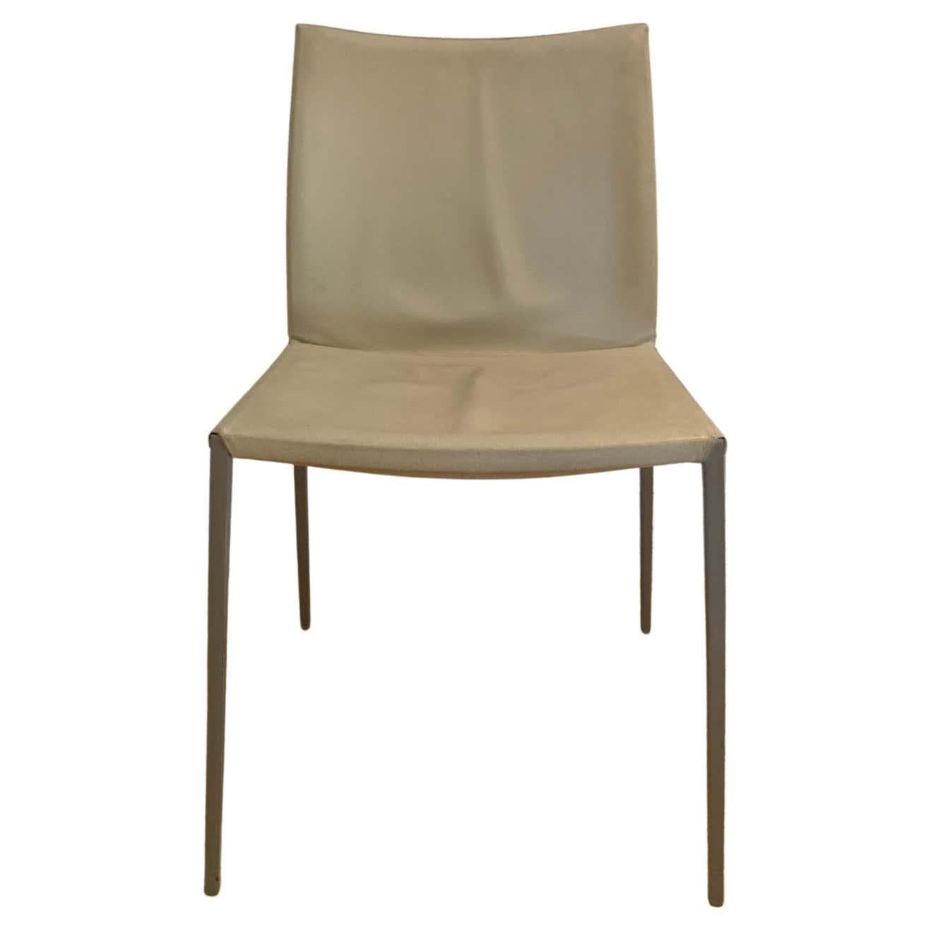 Lia leather dining chair by Roberto Barbieri for Zanotta
Made in Italy
In stock in Los Angeles

Condition: Fair (please refer to the product images to view the condition of the chairs).