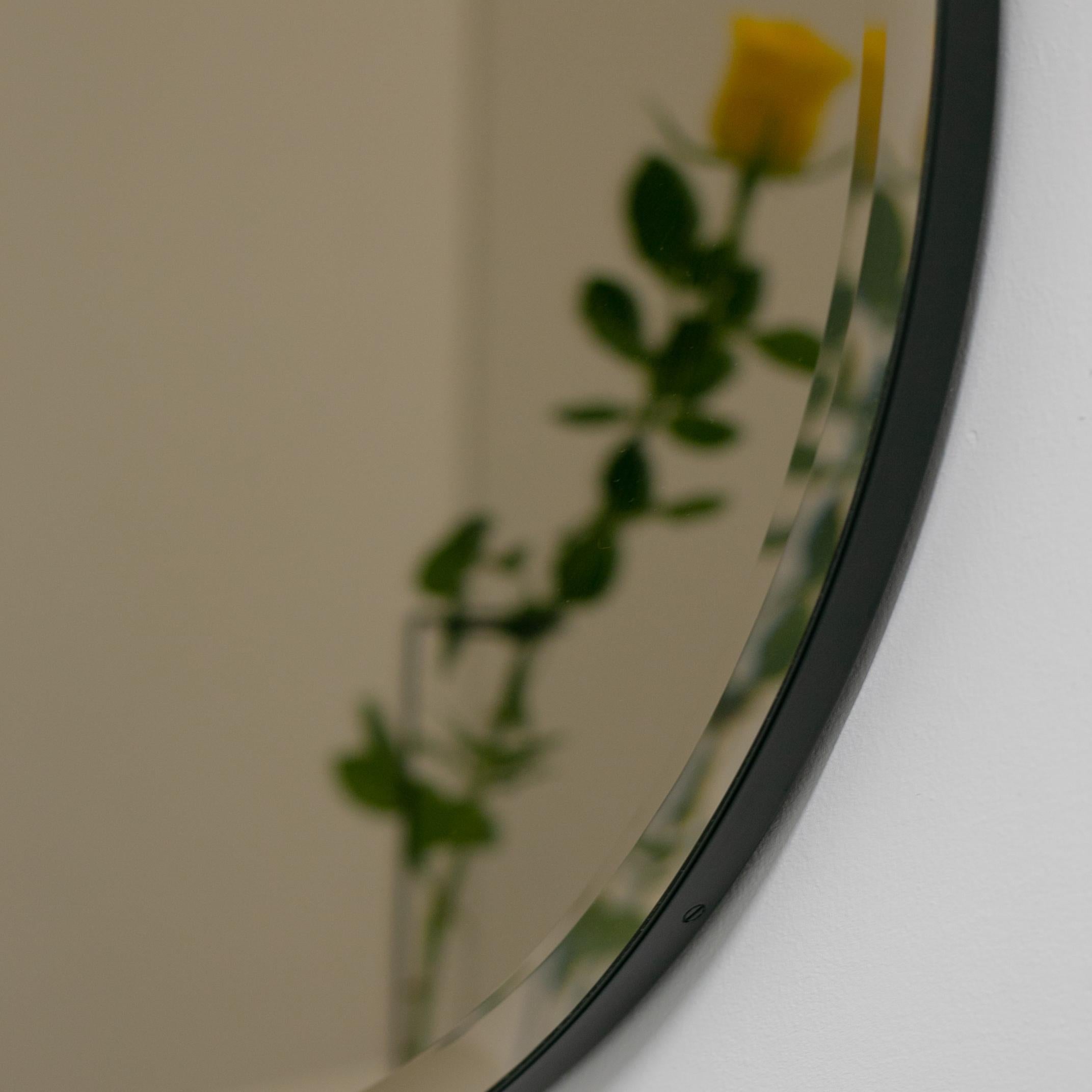 Organic Modern In Stock Orbis Bevelled Bronze Tinted Round Mirror, Black Frame, Medium For Sale