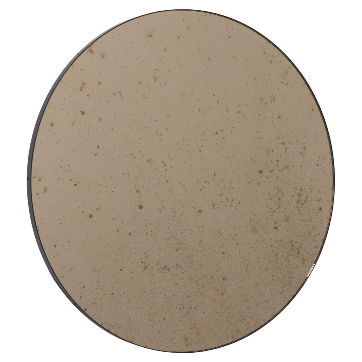 In Stock, Orbis Round Bronze Antiqued Modernist Mirror with Black Frame, Medium