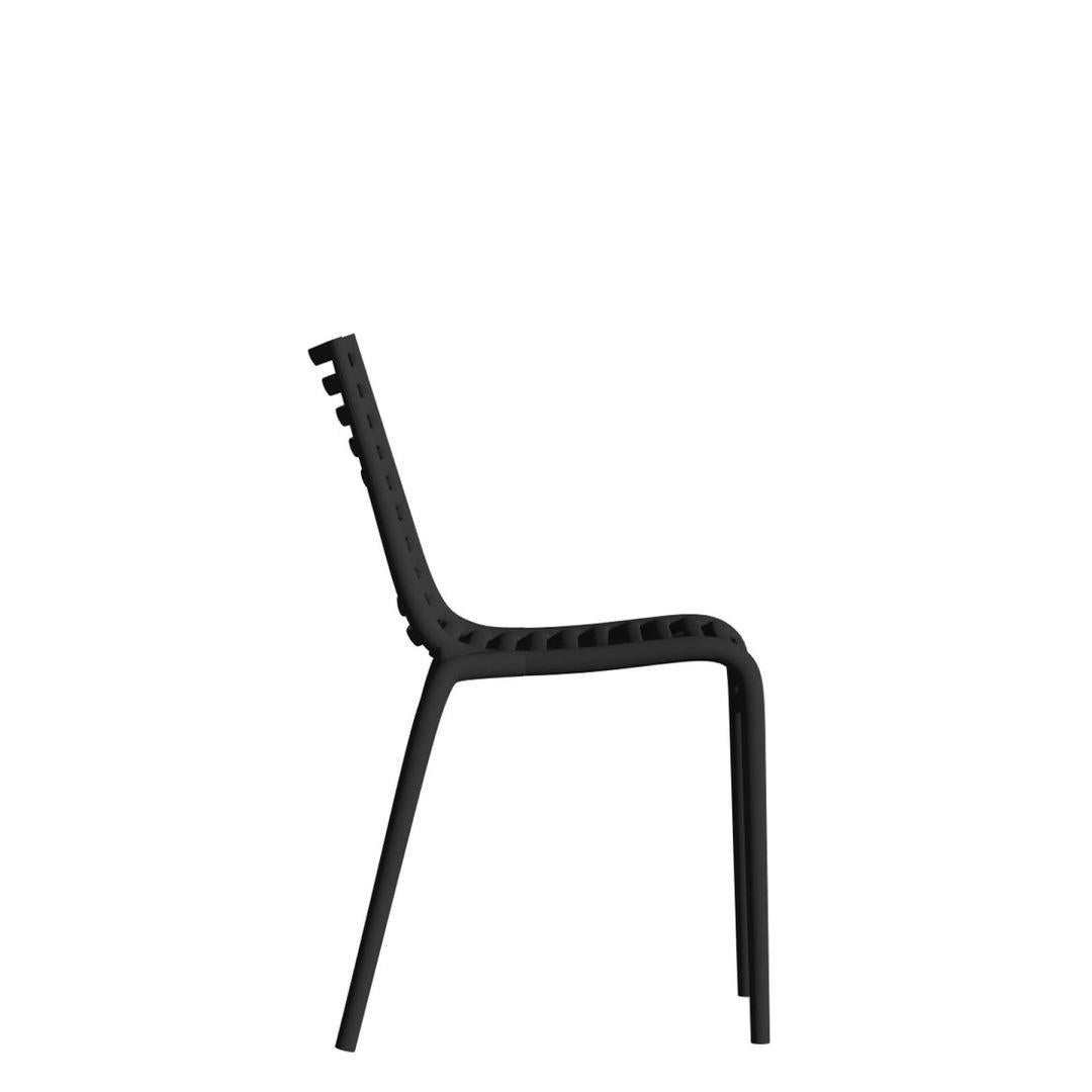 Designer
Philippe Starck – 2021
A contemporary riff on the classic “rail” chair, the PIP-e distills seat, back and arms into a single flowing grid of horizontal ribs. The result is airy transparency with strong chiaroscuro lines.
Care
Hose down or