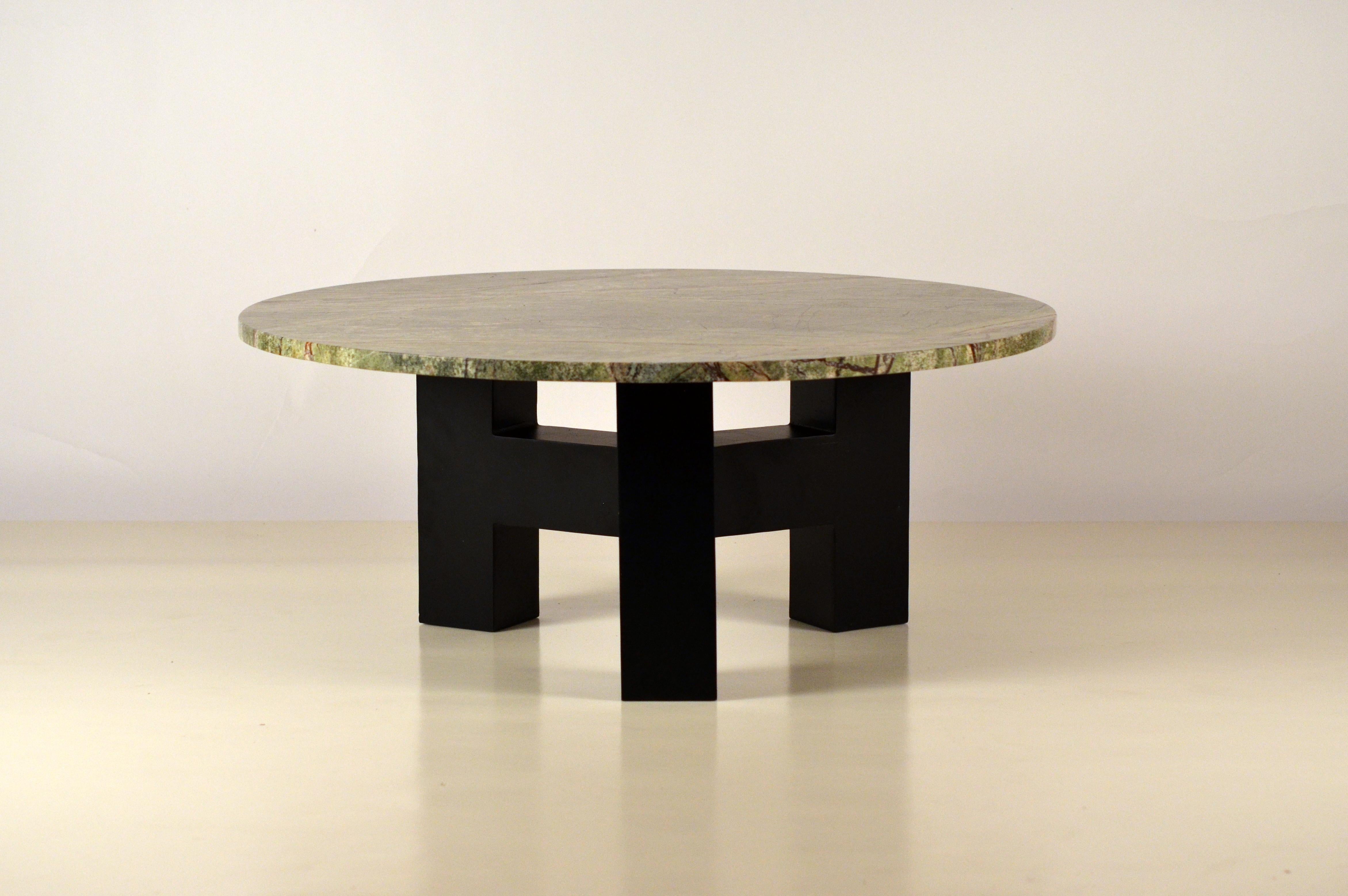 In-Stock 'Upsilon' round veined green marble and blackened steel coffee table by Design Frères.

This table is available now and ready to ship.