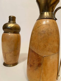 In style of Aldo Tura brass and parchment shaker and jug 1950s