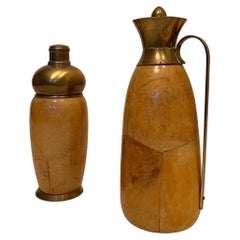 In style of Aldo Tura brass and parchment shaker and jug 1950s 