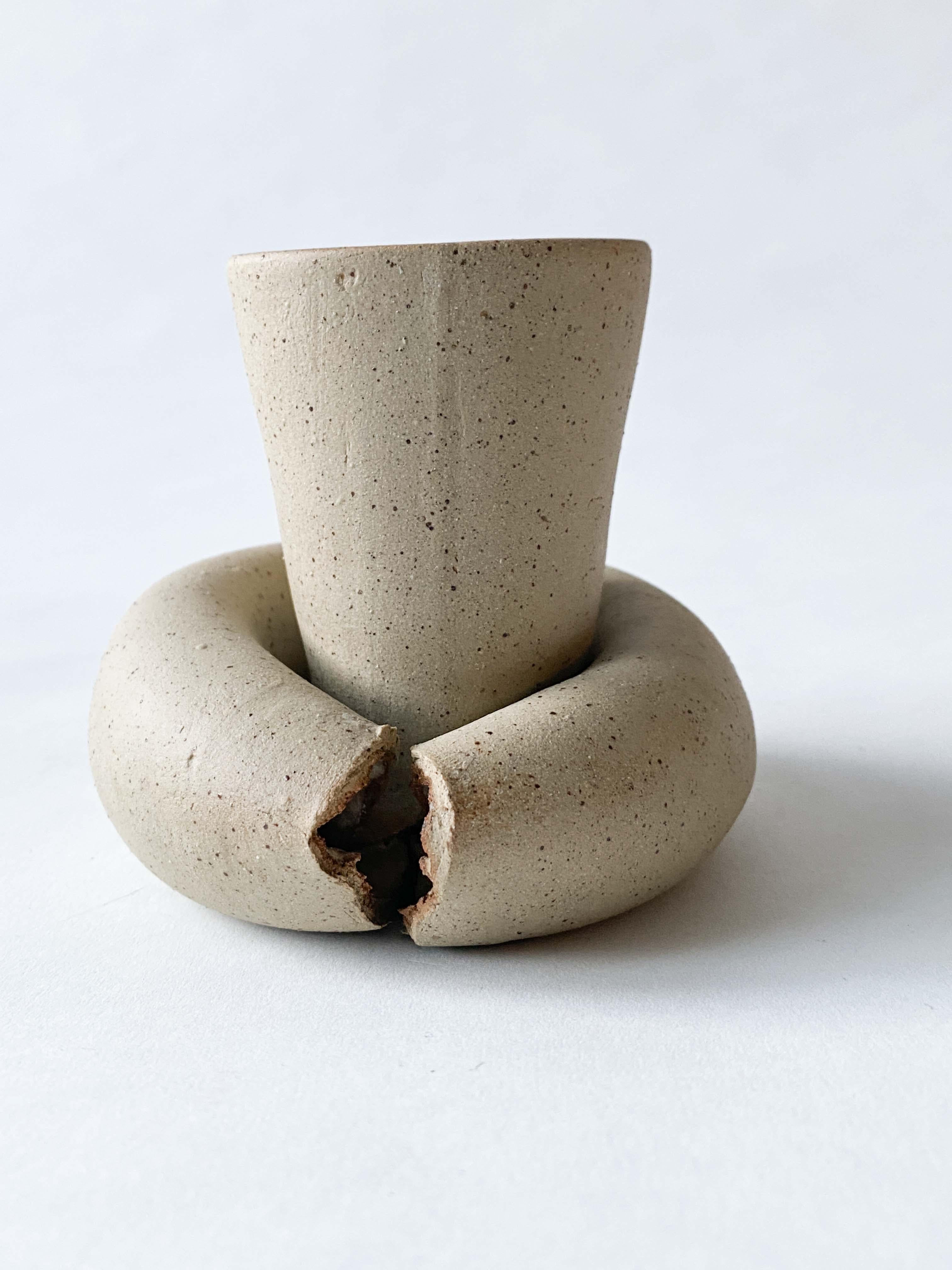 Around The Radiator I Decorative Ceramic Vase by Lillian Tørlen
Unique Piece.
Dimensions: D 11 x W 12 x H 9,5 cm. 
Materials: Ceramic. 

The exhibition Levels of Attachment and Belonging consists of a series of ceramic vases pressed, squeezed, and