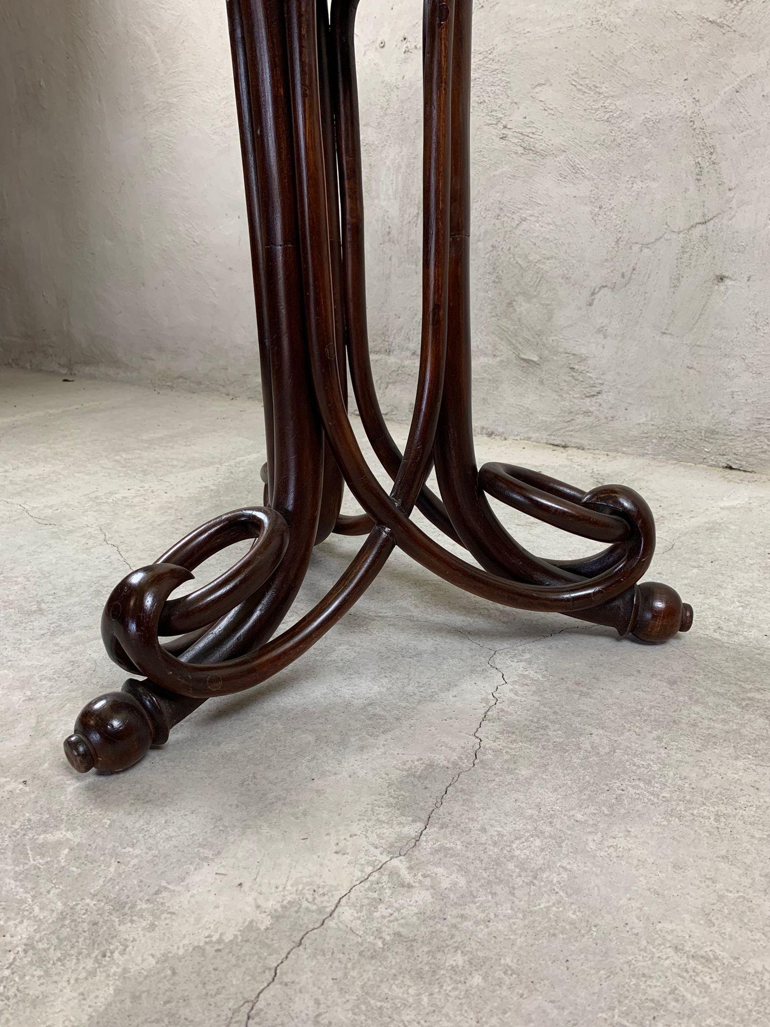 In the manner of J&J Kohn, bentwood and marble side table.  For Sale 1