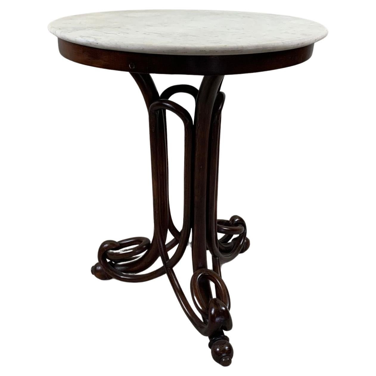 In the manner of J&J Kohn, bentwood and marble side table.  For Sale