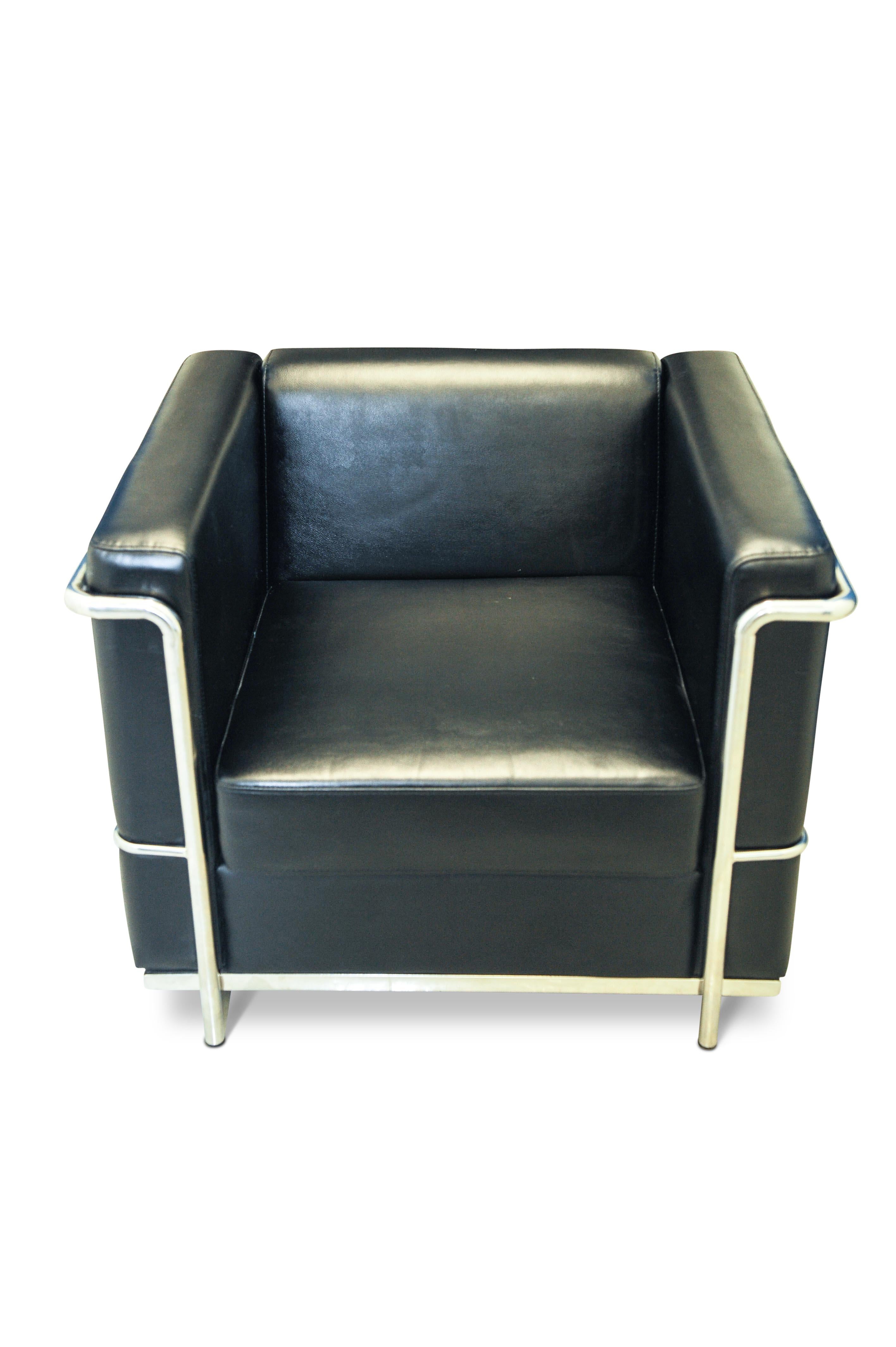 In the manner of Le Corbusier, A LC2 black leather armchair within a chrome frame.

This chair has most certainly been styled to represent the iconic Corbusier LC2 lounge chair of the 1920s. Designed by Charlotte Perriand and Pierre