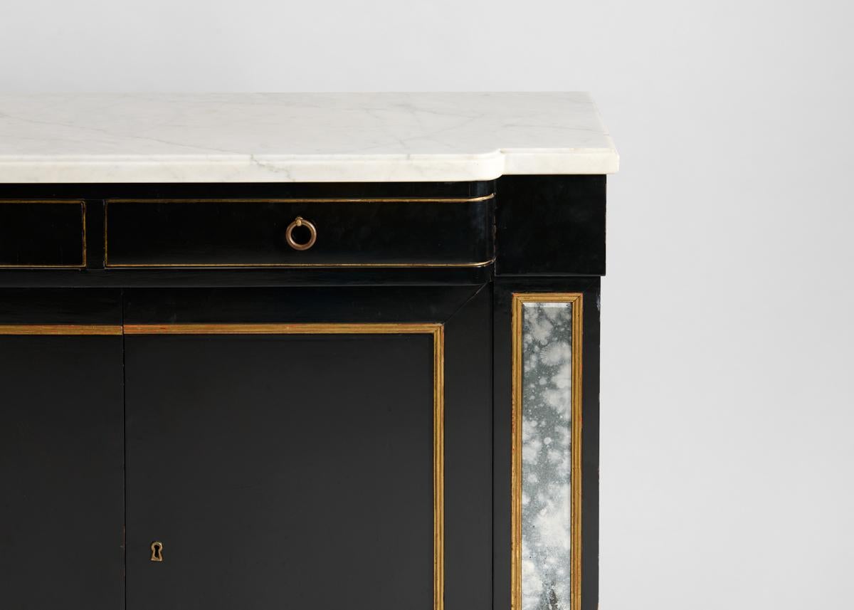 Art Deco In the manner of Maison Jansen, Ebonized, Mirrored, and Parcel-gilt Console For Sale