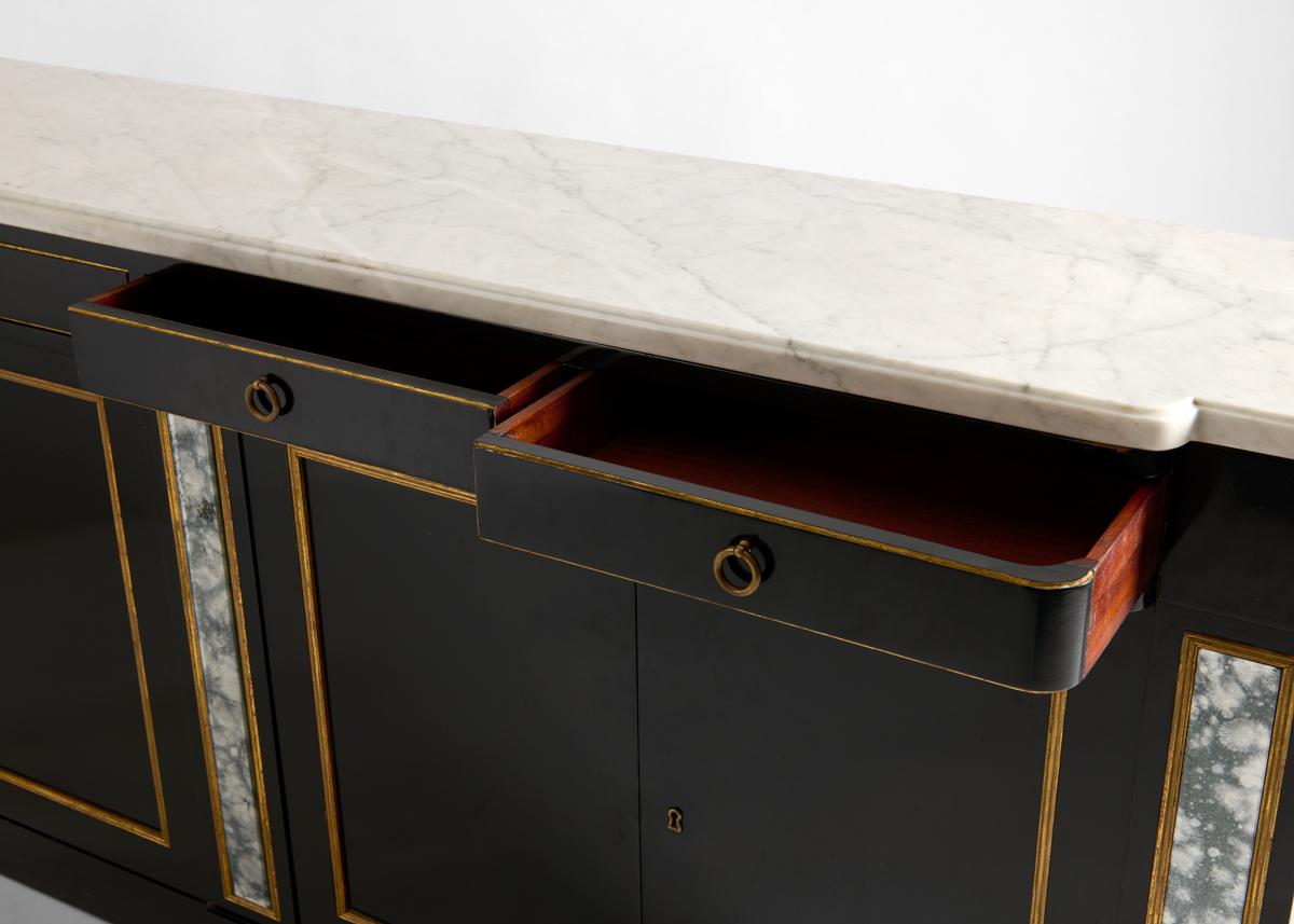 Gilt In the manner of Maison Jansen, Ebonized, Mirrored, and Parcel-gilt Console For Sale