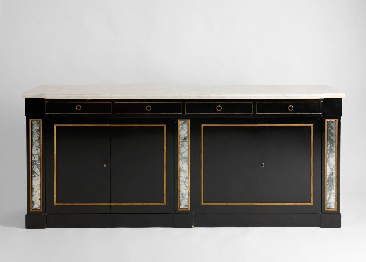 In the manner of Maison Jansen, Ebonized, Mirrored, and Parcel-gilt Console In Good Condition For Sale In New York, NY