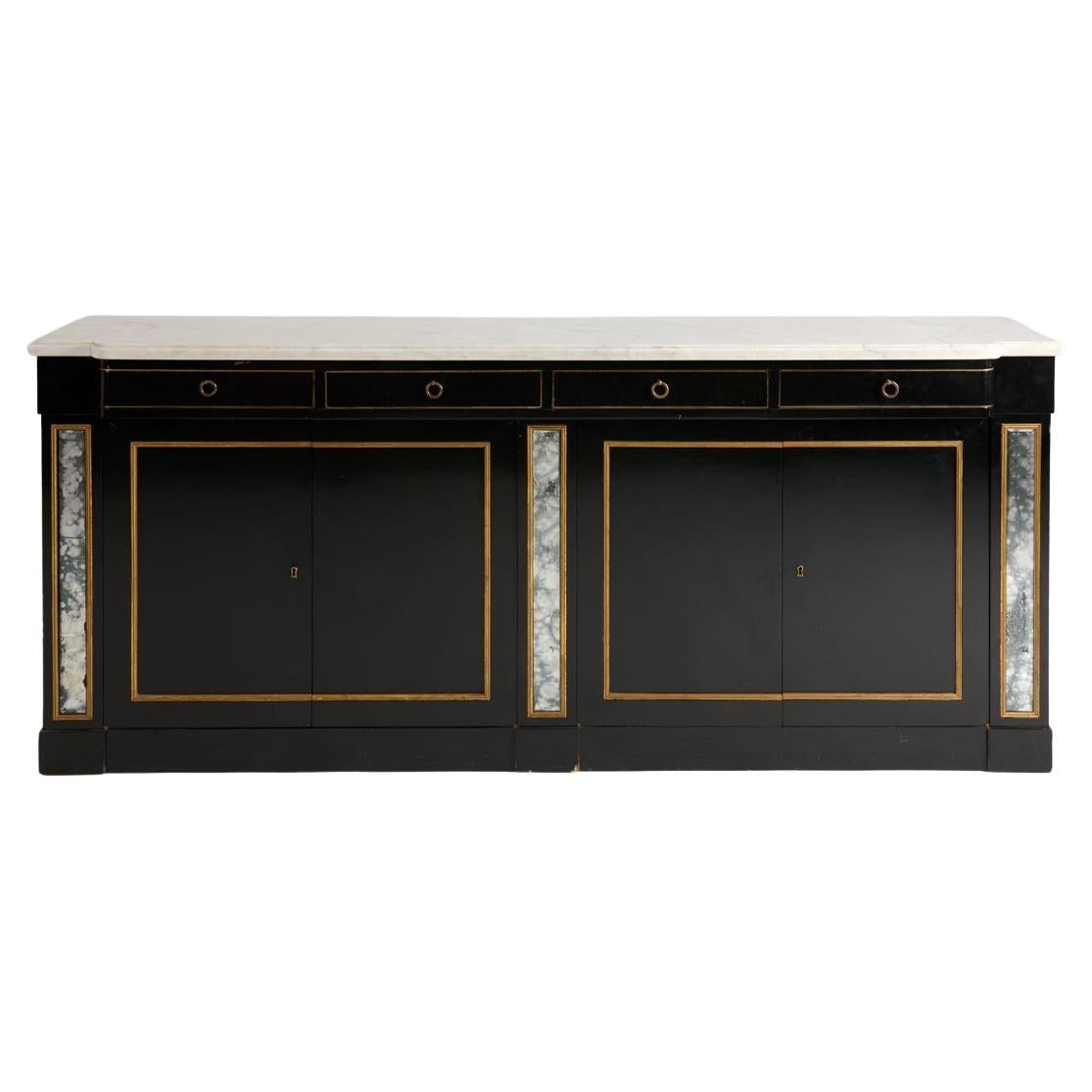 In the manner of Maison Jansen, Ebonized, Mirrored, and Parcel-gilt Console For Sale