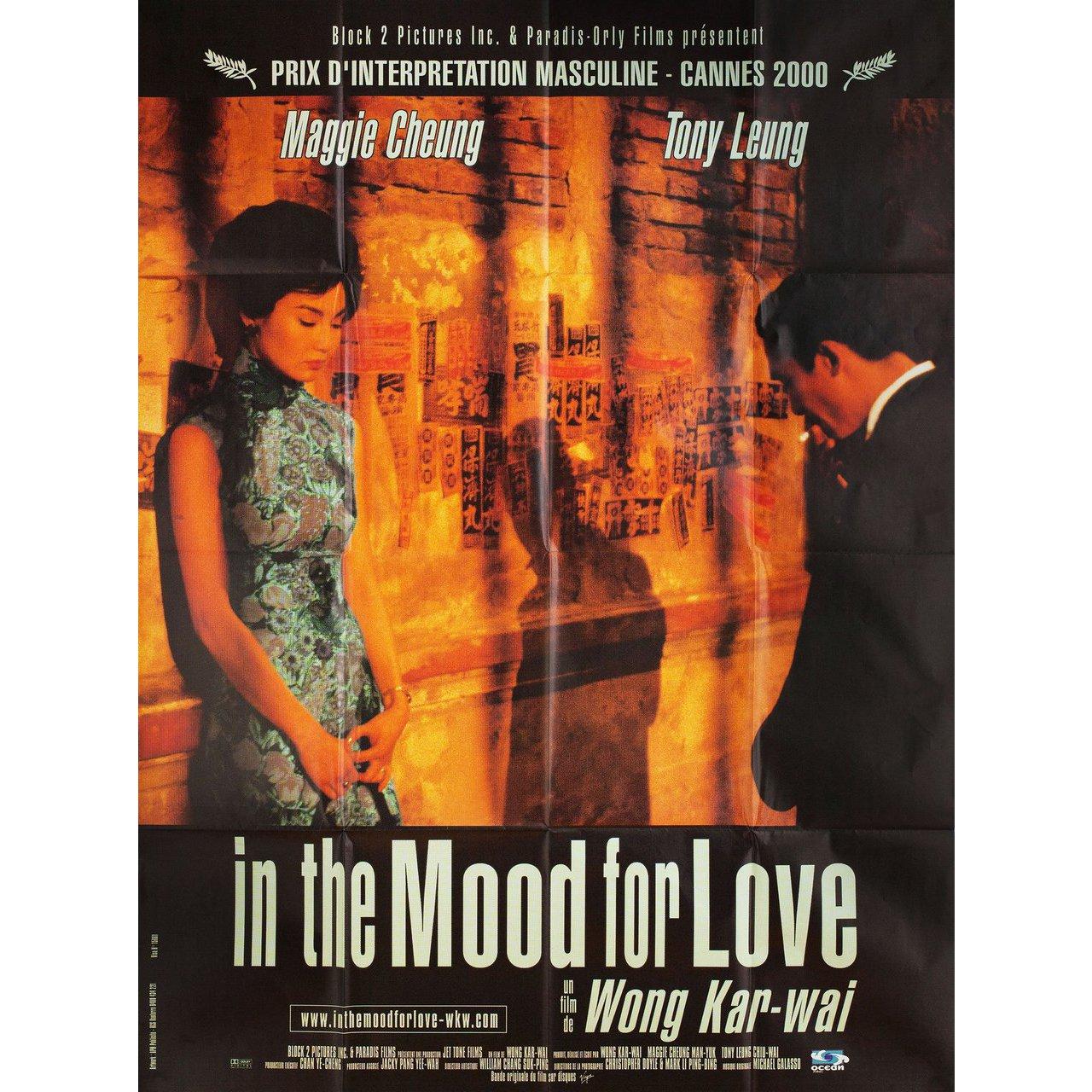 Original 2000 French grande poster for the film “In the Mood for Love” directed by Kar Wai Wong with Maggie Cheung / Tony Chiu Wai Leung / Ping Lam Siu / Tung Cho 'Joe' Cheung. Fine condition, folded. Many original posters were issued folded or were