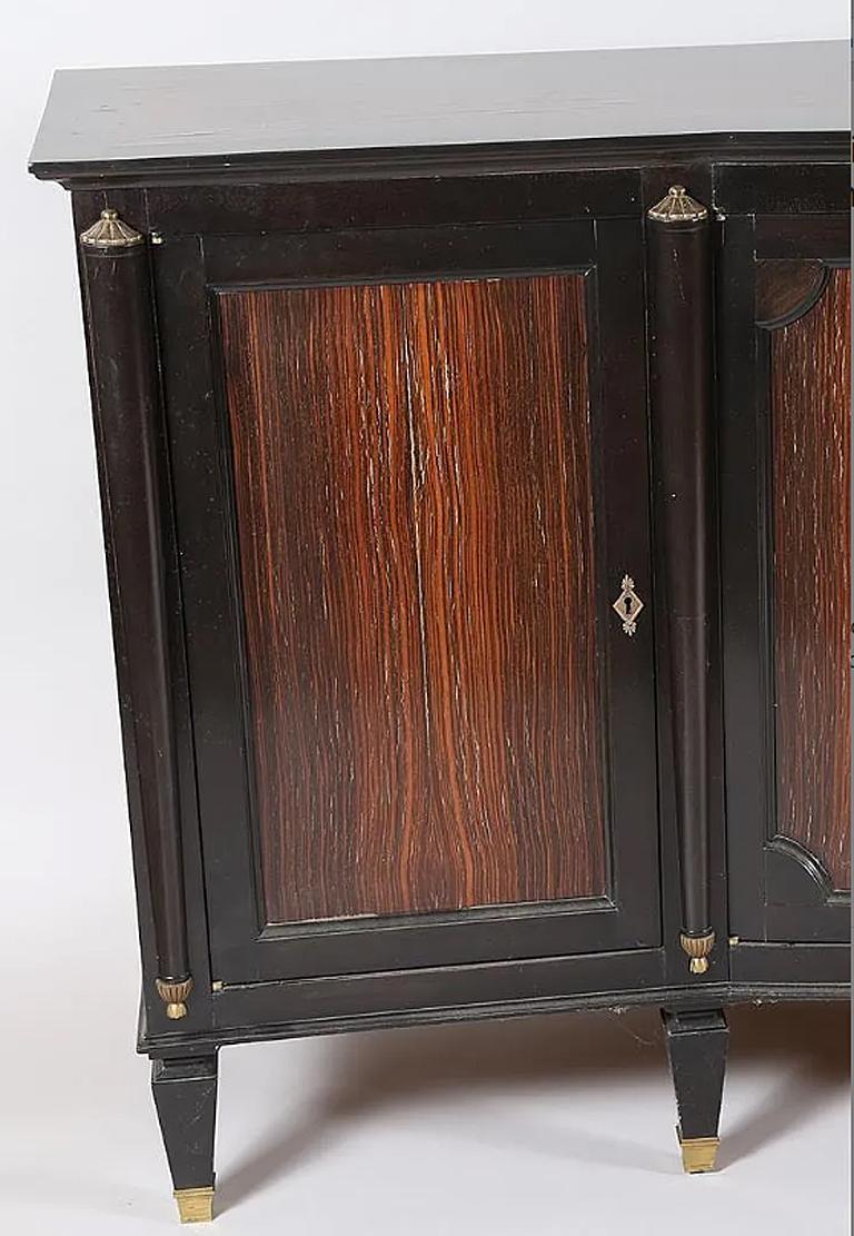 In the style of André Arbus, Art Deco sideboard in mahogany and blackened wood, circa 1940
light uplifting of the veneer on the top.