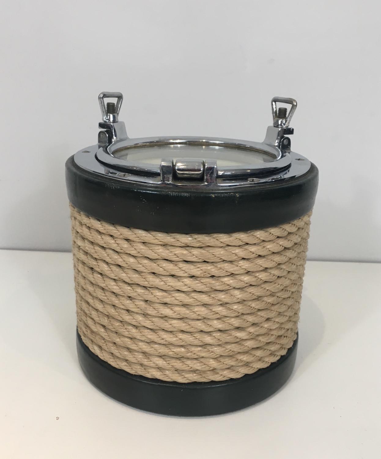 In the style of Jacques Adnet. Unusual chrome, leather and rope ice bucket, French, circa 1950.