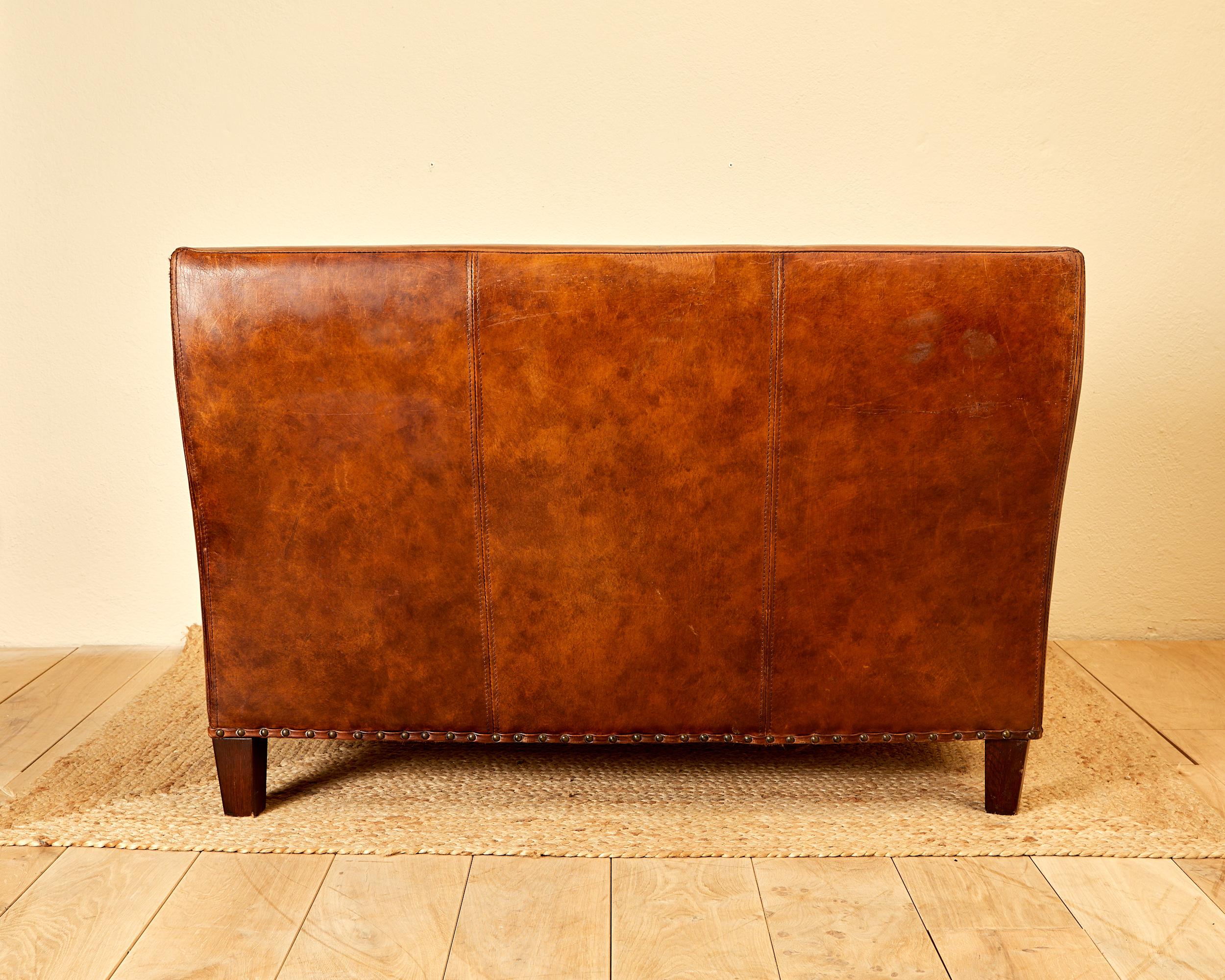 In the style of Jean Michel Franck, leather sofa, circa 1930, France. 5