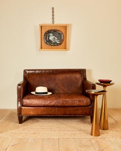 In the style of Jean Michel Franck, leather sofa, circa 1930, France.