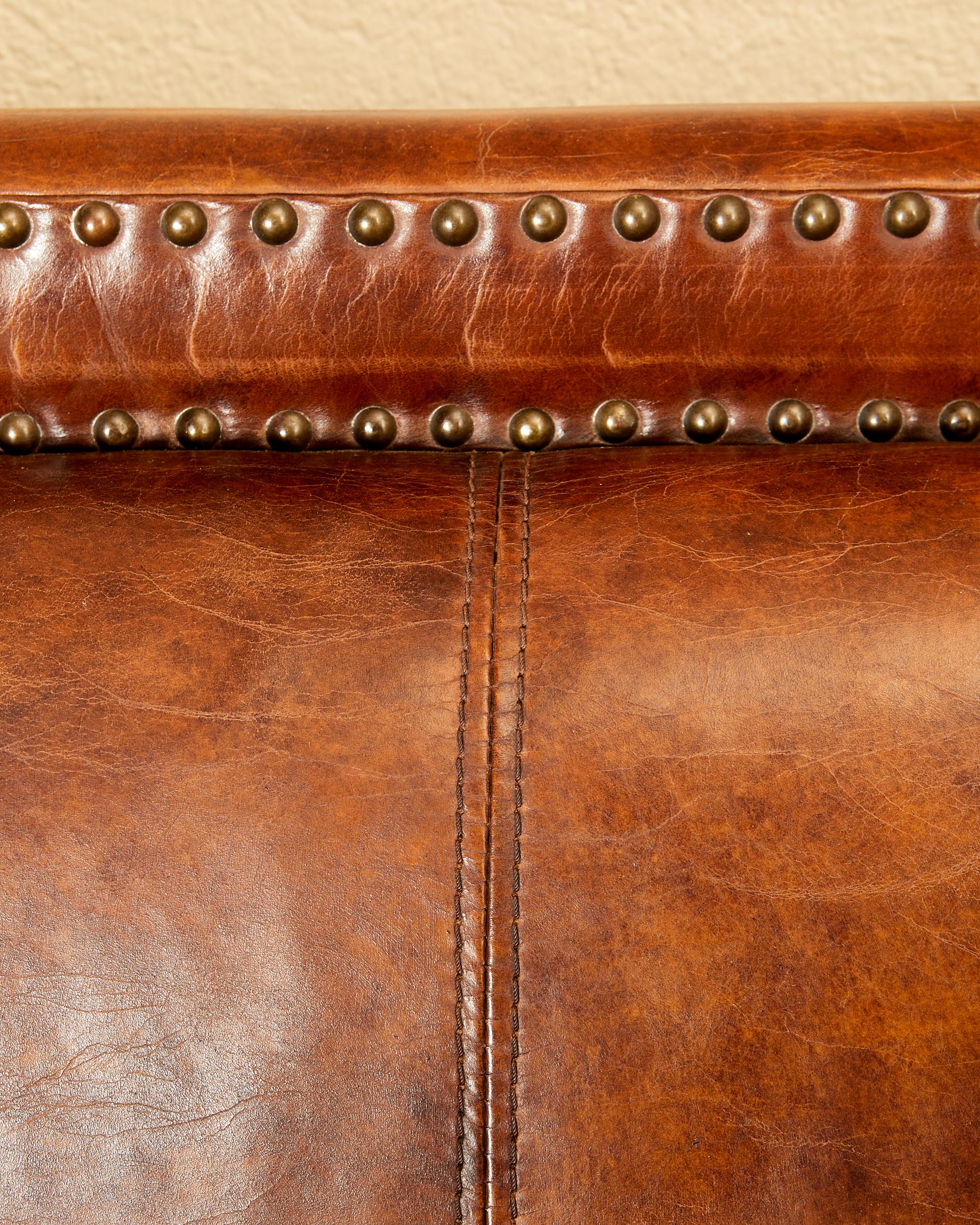 Leather In the style of Jean Michel Franck, leather sofa, circa 1930, France.