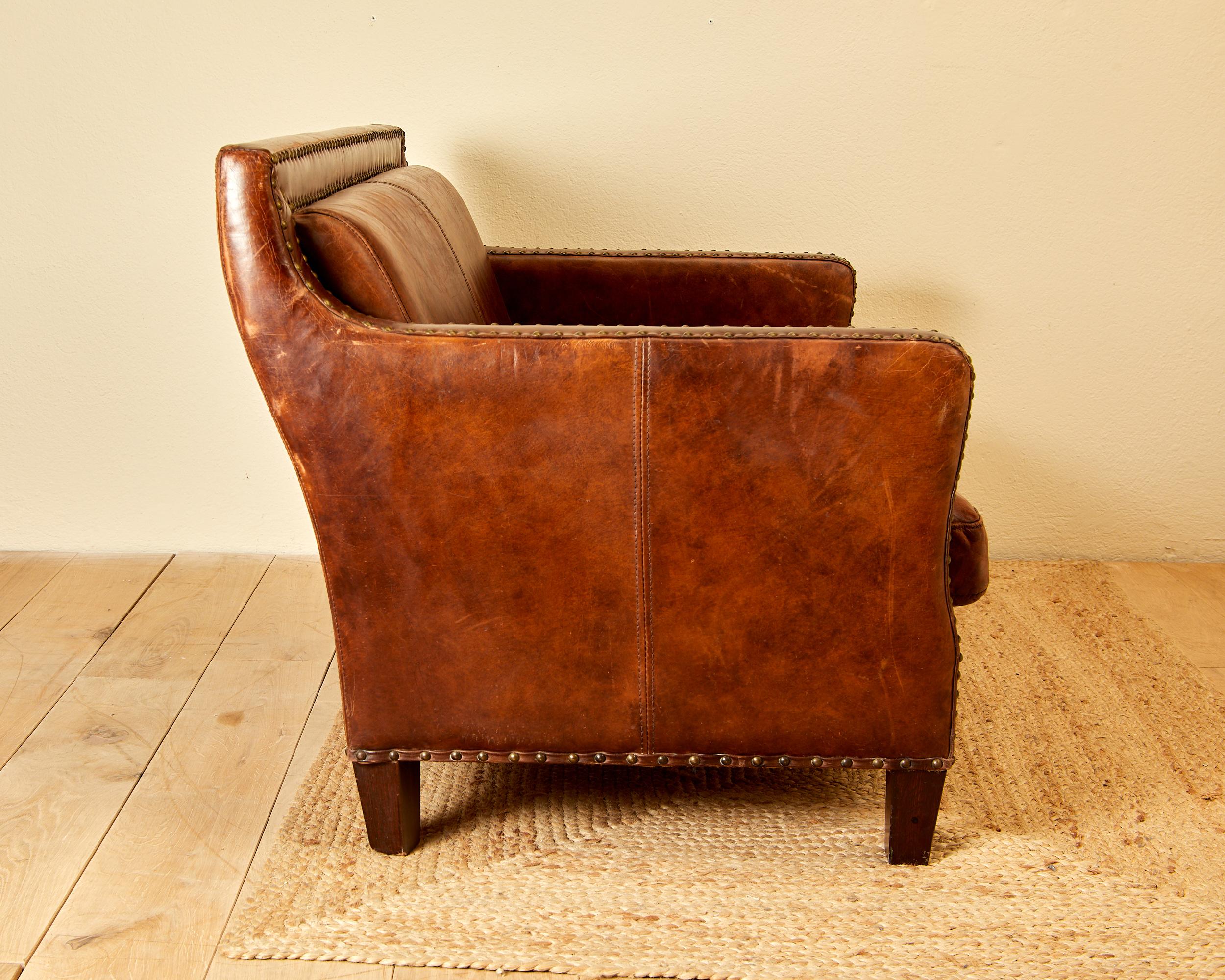 In the style of Jean Michel Franck, leather sofa, circa 1930, France. 2