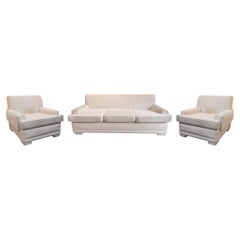 In the style of Jean-Michel Frank, Set of one sofa and two armchairs