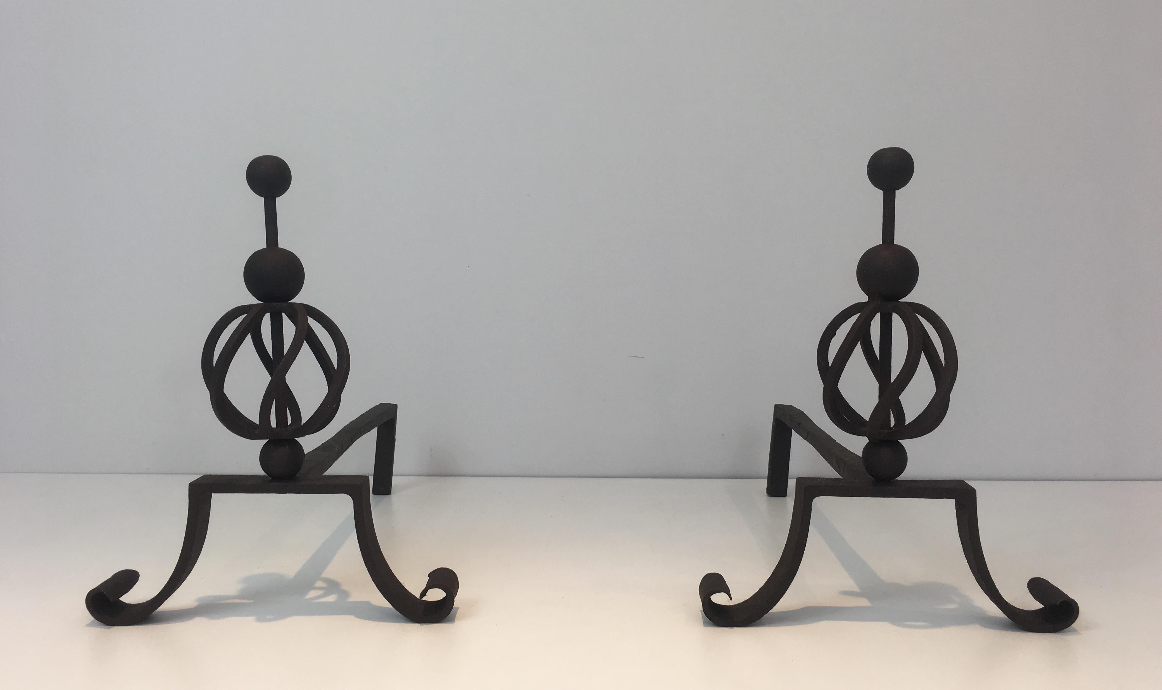 This pair of wrought iron andirons are very elegant and made of a very good quality. It is a french work, circa 1940.